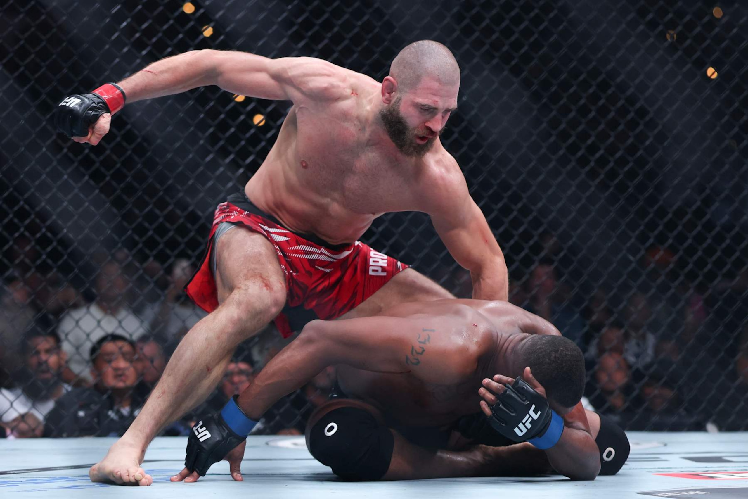 INGLEWOOD, CALIFORNIA - JANUARY 18: JiÅí Procházka of Czechia punches Jamahal Hill of the United States in a light heavyweight fight during UFC 311 at Intuit Dome on January 18, 2025 in Inglewood, California. (Photo by Harry How/Getty Images) INGLEWOOD, CALIFORNIA - JANUARY 18: JiÅí Procházka of Czechia punches Jamahal Hill of the United States in a light heavyweight fight during UFC 311 at Intuit Dome on January 18, 2025 in Inglewood, California. (Photo by Harry How/Getty Images)