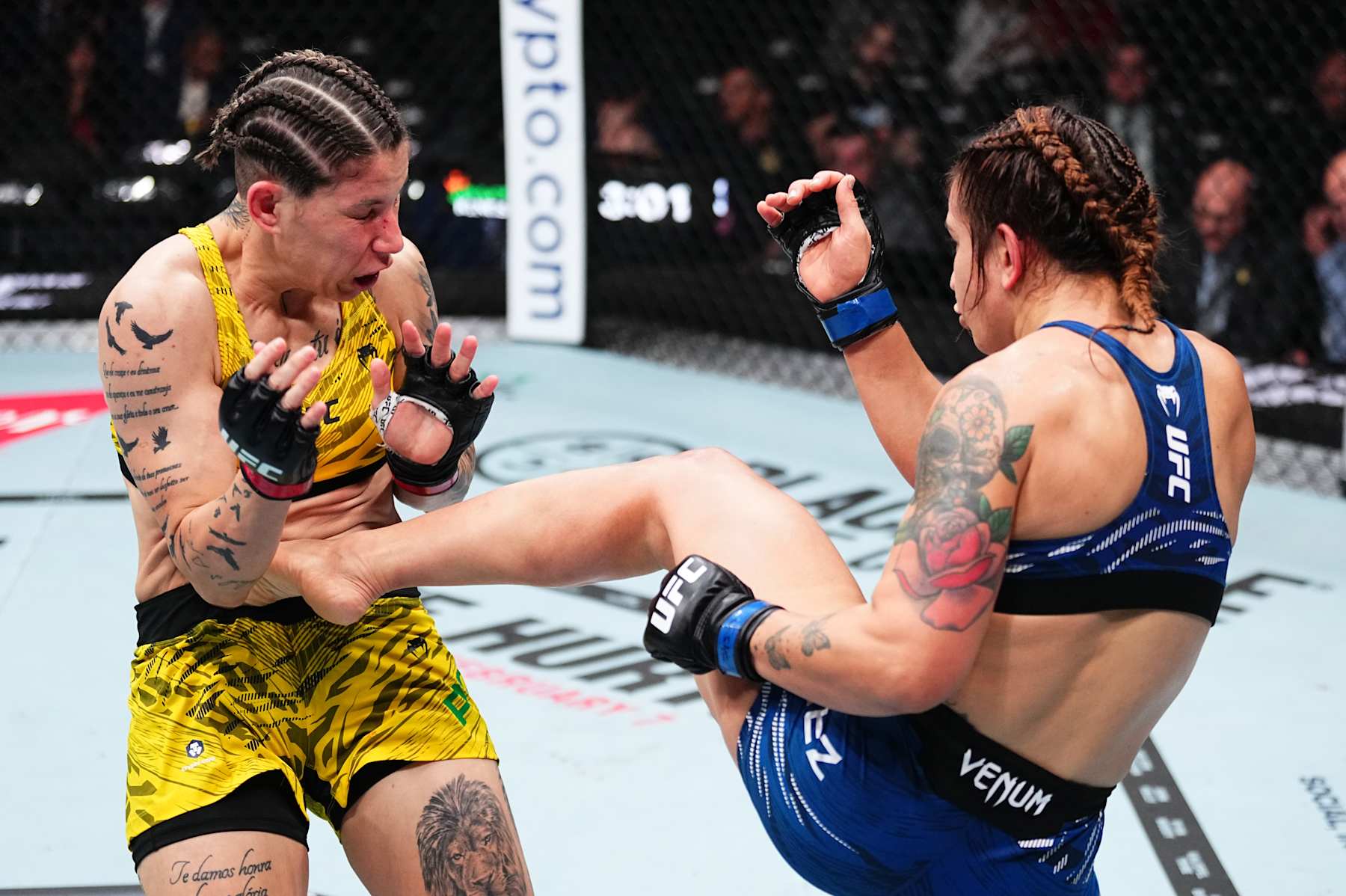 INGLEWOOD, CALIFORNIA - JANUARY 18: (R-L) Ailin Perez of Argentina kicks Karol Rosa of Brazil in a bantamweight fight during the UFC 311 event at Intuit Dome on January 18, 2025 in Inglewood, California. (Photo by Jeff Bottari/Zuffa LLC)