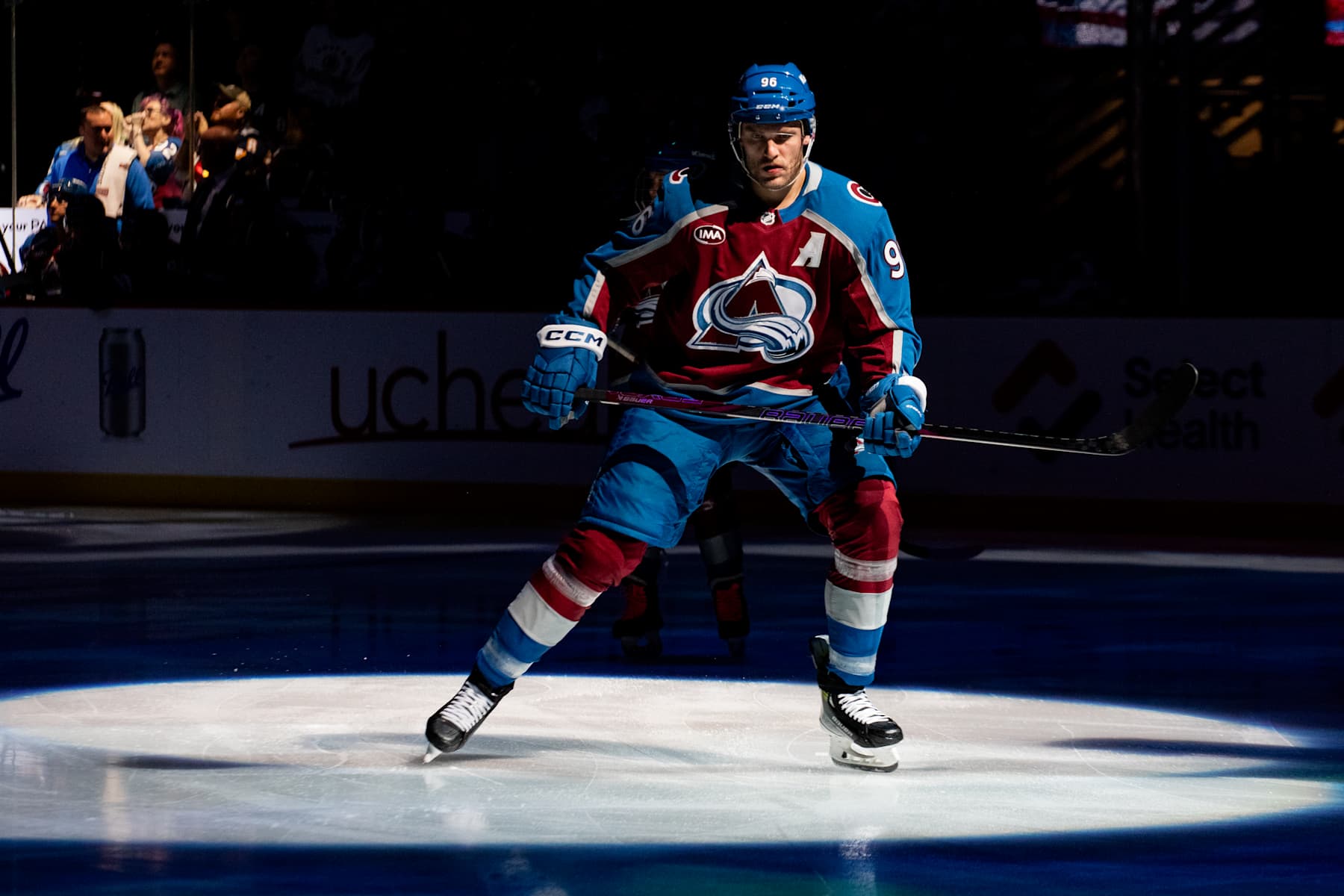 DENVER, COLORADO - OCTOBER 16: Mikko Rantanen #96 of the Colorado Avalanche skates in the spotlight ahed of the game against the Boston Bruins at Ball Arena on October 16, 2024 in Denver, Colorado. (Photo by Ashley Potts/NHLI via Getty Images)