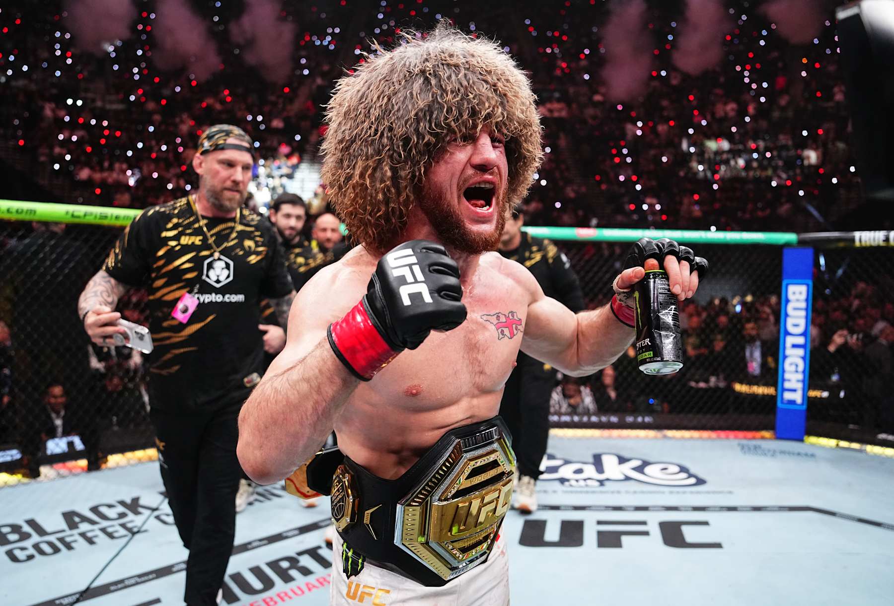 Merab Dvalishvili reacts after a decision victory against Umar Nurmagomedov