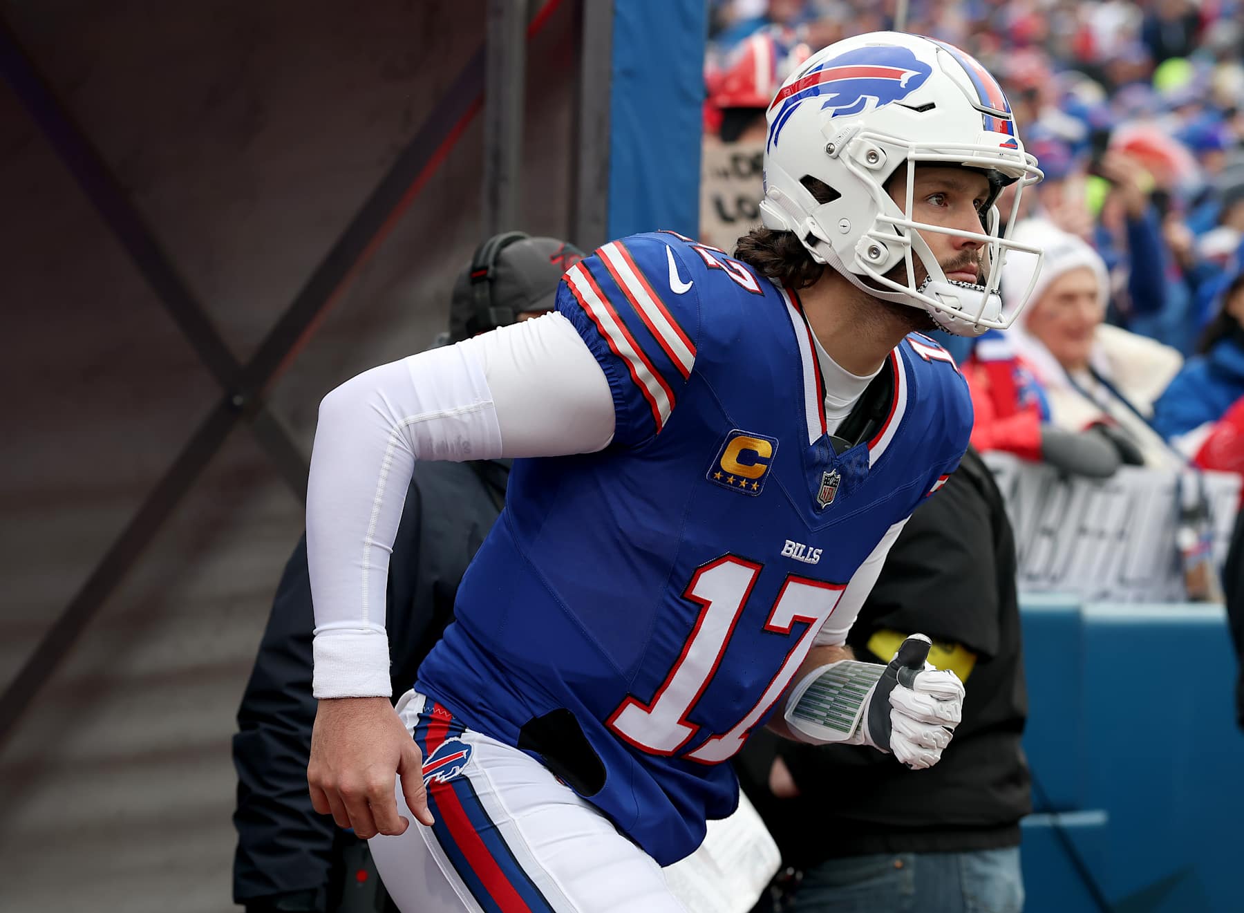ORCHARD PARK, NEW YORK - JANUARY 12: Josh Allen #17 of the Buffalo Bills takes the field before the AFC Wild Card Playoff game against the Denver Broncos at Highmark Stadium on January 12, 2025 in Orchard Park, New York. (Photo by Elsa/Getty Images) ORCHARD PARK, NEW YORK - JANUARY 12: Josh Allen #17 of the Buffalo Bills takes the field before the AFC Wild Card Playoff game against the Denver Broncos at Highmark Stadium on January 12, 2025 in Orchard Park, New York. (Photo by Elsa/Getty Images)