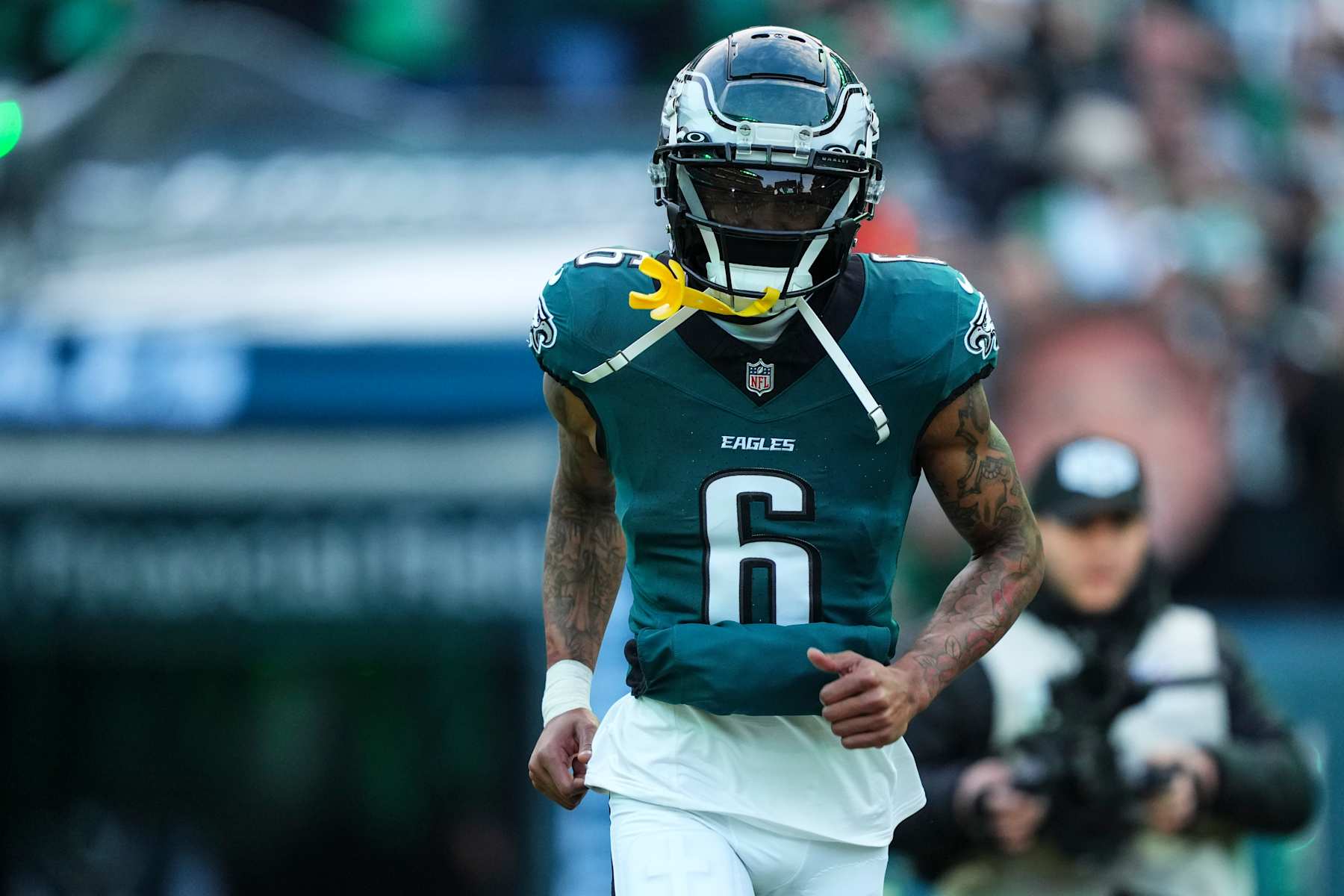 PHILADELPHIA, PA - JANUARY 12: DeVonta Smith #6 of the Philadelphia Eagles runs out of the tunnel prior to an NFL football wild card playoff game against the Green Bay Packers at Lincoln Financial Field on January 12, 2025 in Philadelphia, Pennsylvania. (Photo by Cooper Neill/Getty Images) PHILADELPHIA, PA - JANUARY 12: DeVonta Smith #6 of the Philadelphia Eagles runs out of the tunnel prior to an NFL football wild card playoff game against the Green Bay Packers at Lincoln Financial Field on January 12, 2025 in Philadelphia, Pennsylvania. (Photo by Cooper Neill/Getty Images)