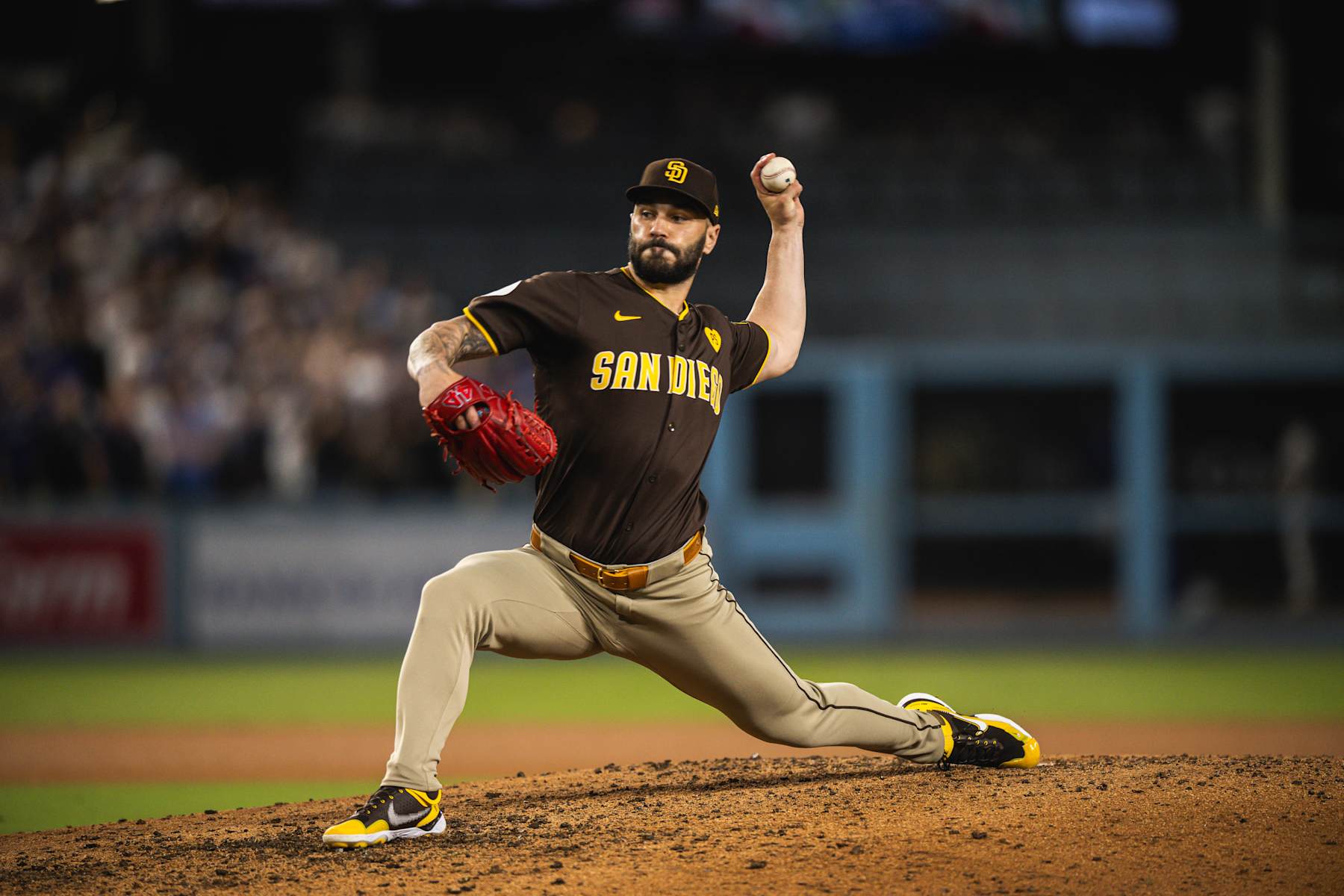 LOS ANGELES, CALIFORNIA - OCTOBER 11: Tanner Scott #66 of the San Diego Padres pitches in the eighth inning of game five of the National League Divisional Series against the Los Angeles Dodgers at Dodger Stadium on October 11, 2024, in Los Angeles, California. (Photo by Matt Thomas/San Diego Padres/Getty Images)