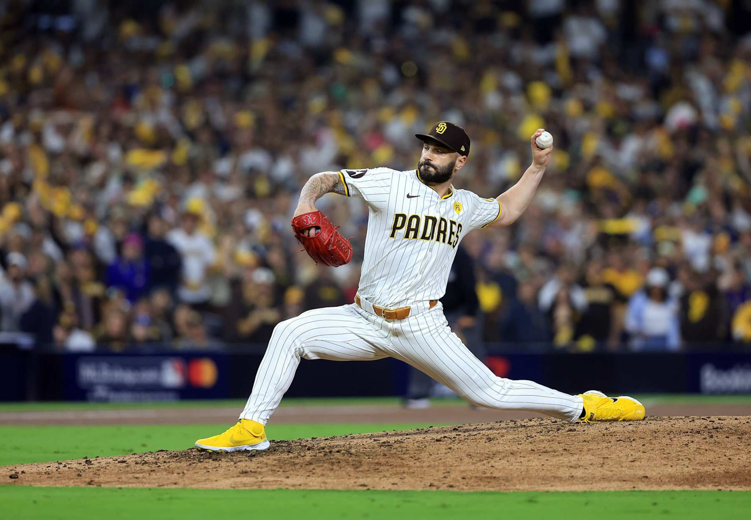 SAN DIEGO, CALIFORNIA - OCTOBER 08: Tanner Scott #66 of the San Diego Padres pitches in the eighth inning against the Los Angeles Dodgers during Game Three of the Division Series at Petco Park on October 08, 2024 in San Diego, California. (Photo by Sean M. Haffey/Getty Images) SAN DIEGO, CALIFORNIA - OCTOBER 08: Tanner Scott #66 of the San Diego Padres pitches in the eighth inning against the Los Angeles Dodgers during Game Three of the Division Series at Petco Park on October 08, 2024 in San Diego, California. (Photo by Sean M. Haffey/Getty Images)