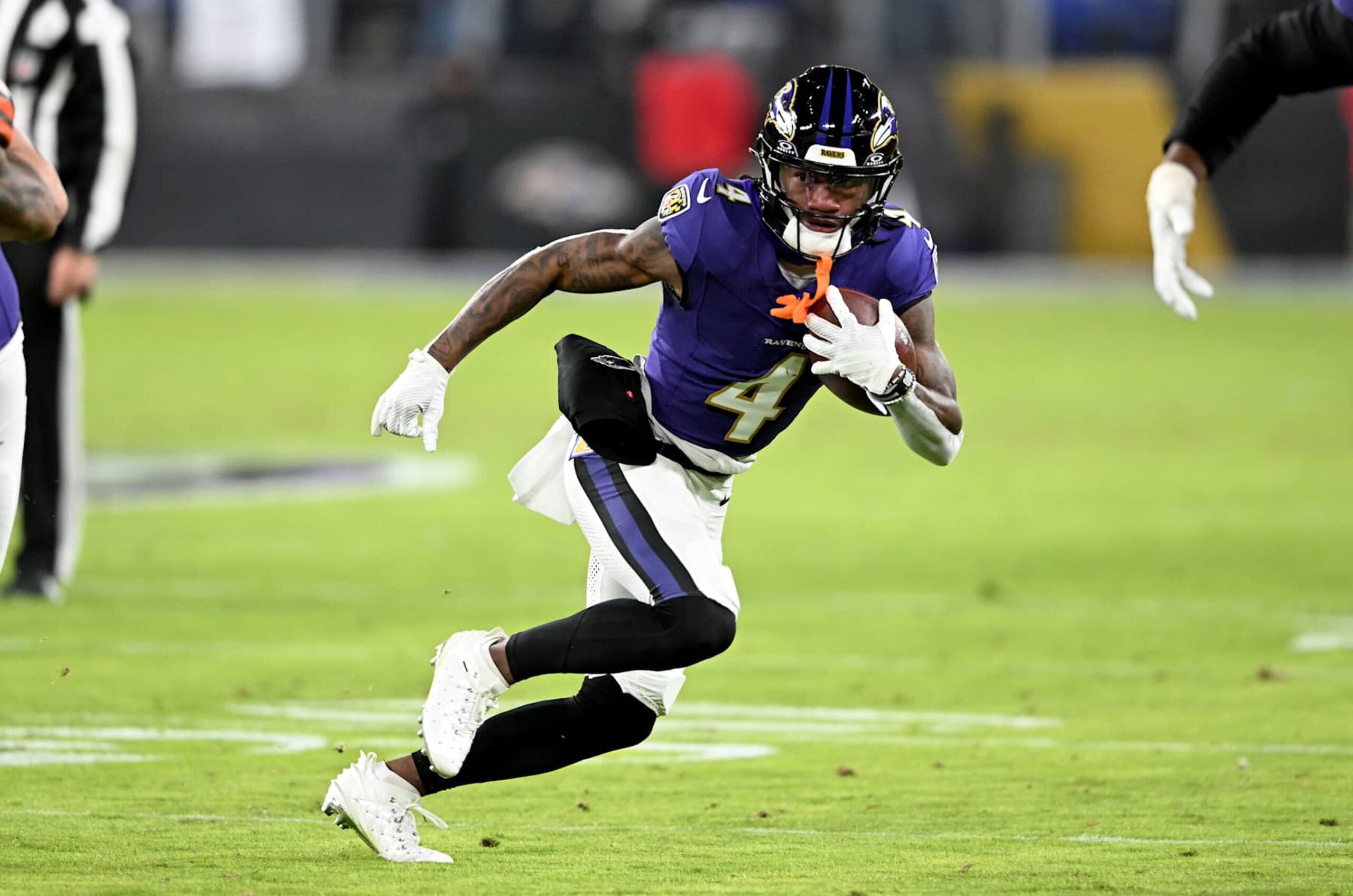 BALTIMORE, MARYLAND - JANUARY 04: Zay Flowers #4 of the Baltimore Ravens runs with the ball after making a catch against the Cleveland Browns at M&T Bank Stadium on January 04, 2025 in Baltimore, Maryland. (Photo by G Fiume/Getty Images) BALTIMORE, MARYLAND - JANUARY 04: Zay Flowers #4 of the Baltimore Ravens runs with the ball after making a catch against the Cleveland Browns at M&T Bank Stadium on January 04, 2025 in Baltimore, Maryland. (Photo by G Fiume/Getty Images)