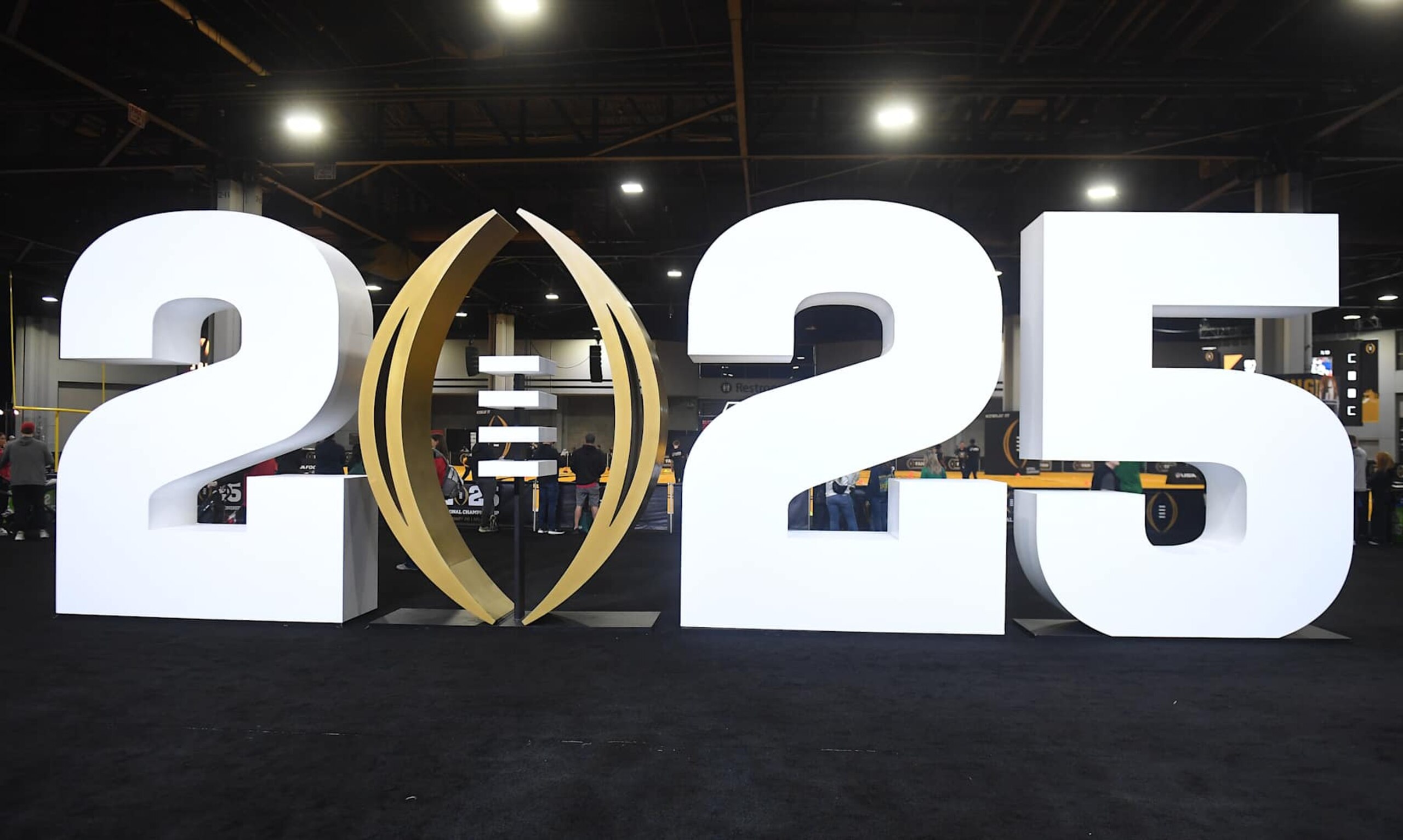 ATLANTA, GEORGIA - JANUARY 18: A detailed view of the 2025 College Football Playoff National Championship logo on display at 2025 CFP National Championship Playoff Fan Central at Georgia World Congress Center on January 18, 2025 in Atlanta, Georgia. (Photo by Paras Griffin/Getty Images) ATLANTA, GEORGIA - JANUARY 18: A detailed view of the 2025 College Football Playoff National Championship logo on display at 2025 CFP National Championship Playoff Fan Central at Georgia World Congress Center on January 18, 2025 in Atlanta, Georgia. (Photo by Paras Griffin/Getty Images)