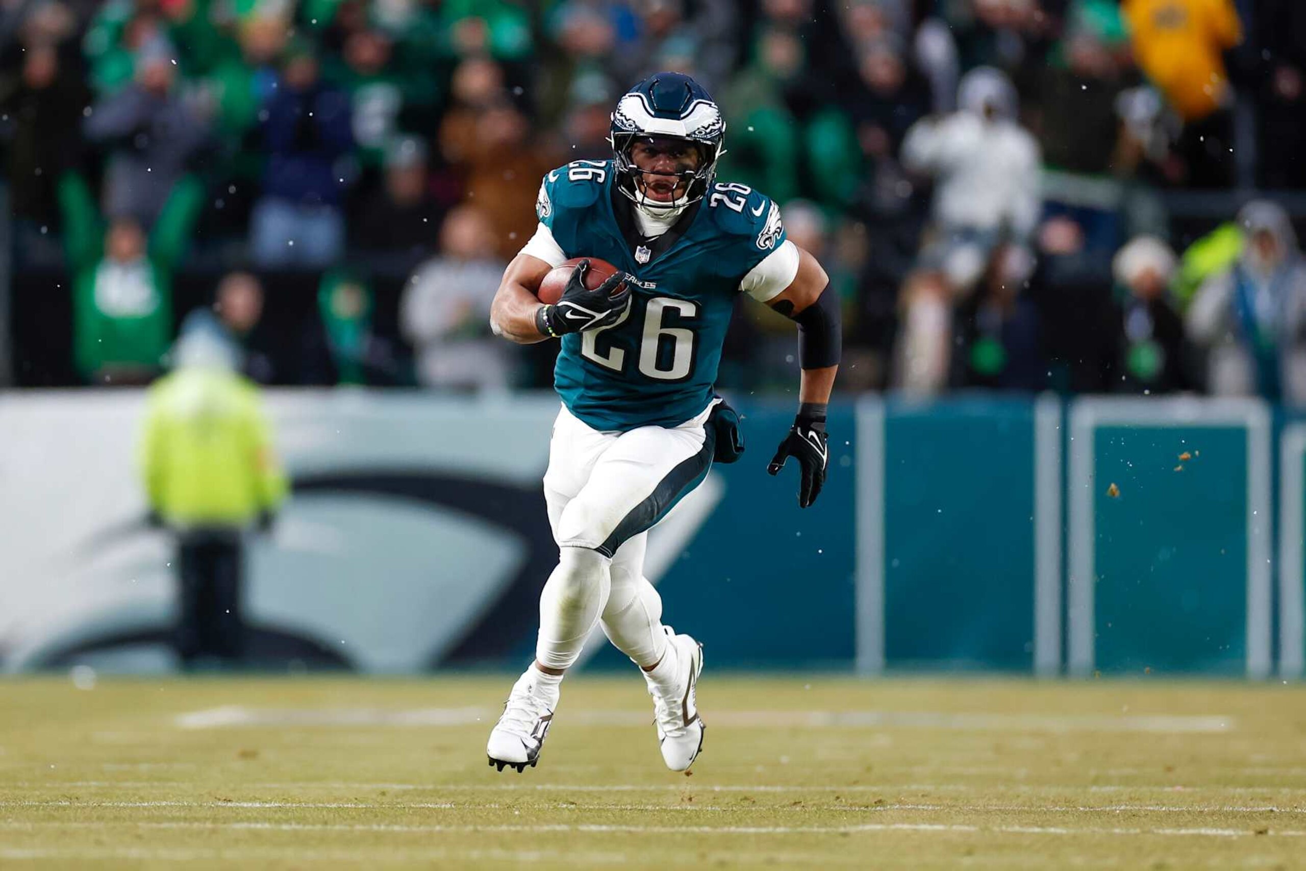 PHILADELPHIA, PENNSYLVANIA - JANUARY 19: Saquon Barkley #26 of the Philadelphia Eagles runs for a touchdown in the first quarter during the NFC Divisional Playoff game against the Los Angeles Rams at Lincoln Financial Field on January 19, 2025 in Philadelphia, Pennsylvania. (Photo by Brandon Sloter/Getty Images) PHILADELPHIA, PENNSYLVANIA - JANUARY 19: Saquon Barkley #26 of the Philadelphia Eagles runs for a touchdown in the first quarter during the NFC Divisional Playoff game against the Los Angeles Rams at Lincoln Financial Field on January 19, 2025 in Philadelphia, Pennsylvania. (Photo by Brandon Sloter/Getty Images)
