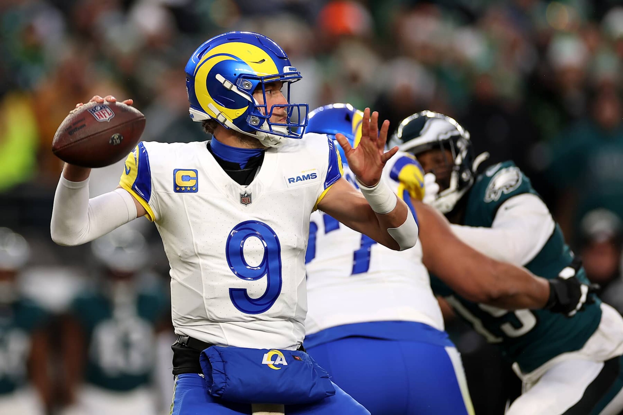 PHILADELPHIA, PENNSYLVANIA - JANUARY 19: Matthew Stafford #9 of the Los Angeles Rams throws a pass against the Philadelphia Eagles during the first quarter during the NFC Divisional Playoff at Lincoln Financial Field on January 19, 2025 in Philadelphia, Pennsylvania. (Photo by Sarah Stier/Getty Images) PHILADELPHIA, PENNSYLVANIA - JANUARY 19: Matthew Stafford #9 of the Los Angeles Rams throws a pass against the Philadelphia Eagles during the first quarter during the NFC Divisional Playoff at Lincoln Financial Field on January 19, 2025 in Philadelphia, Pennsylvania. (Photo by Sarah Stier/Getty Images)