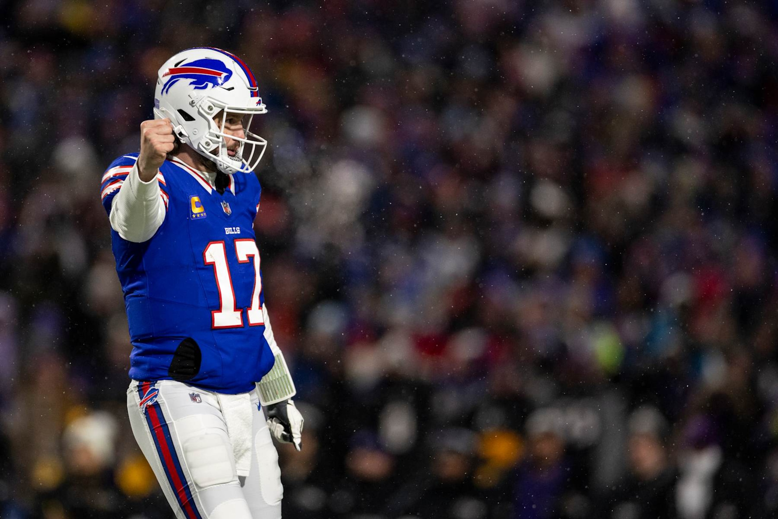 ORCHARD PARK, NEW YORK - JANUARY 19: Josh Allen #17 of the Buffalo Bills reacts after a touchdown during an NFL Football game against the Baltimore Ravens at Highmark Stadium on January 19, 2025 in Orchard Park, New York. (Photo by Michael Owens/Getty Images)