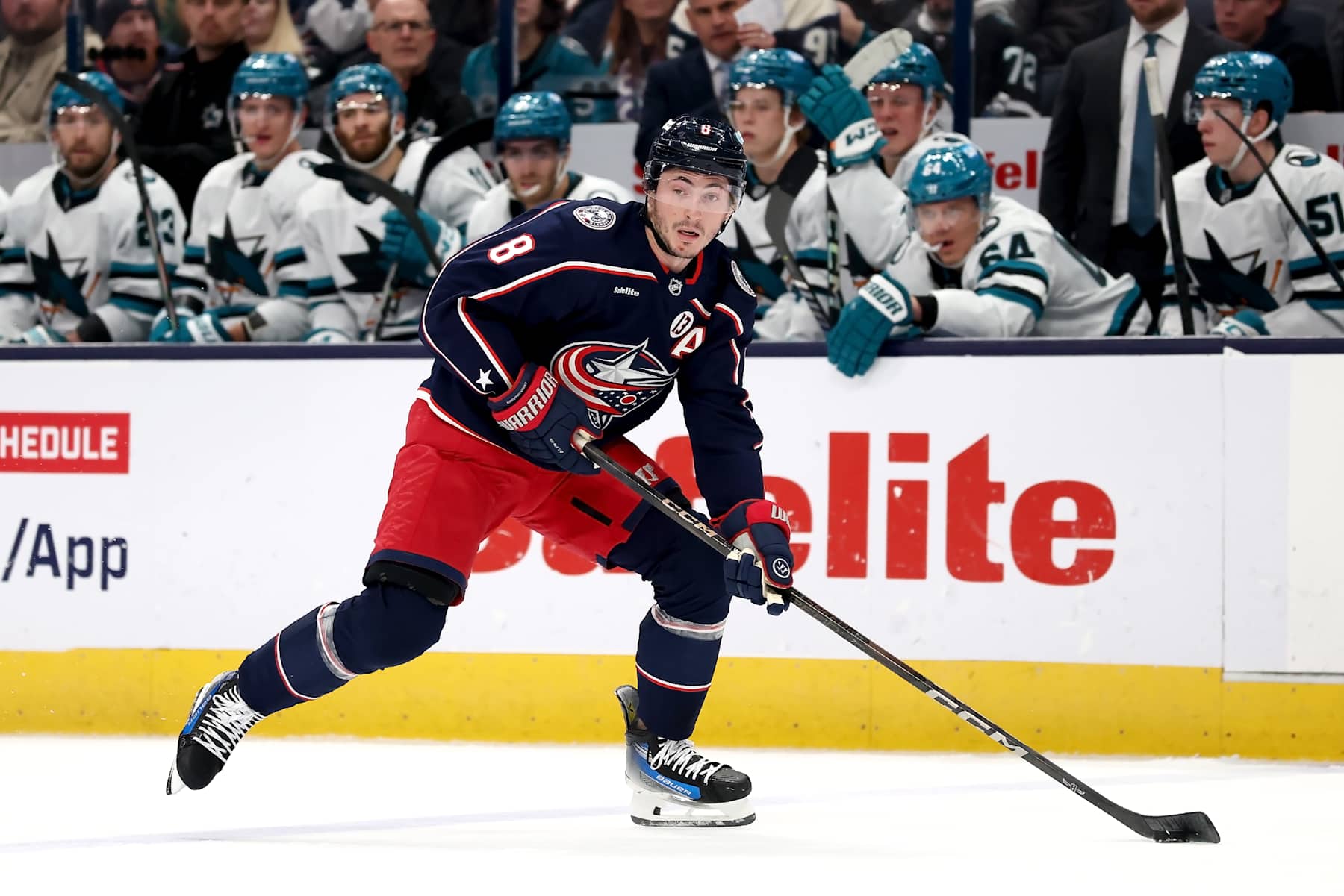 COLUMBUS, OHIO - JANUARY 16:  Zach Werenski #8 of the Columbus Blue Jackets controls the puck during the game against the San Jose Sharks at Nationwide Arena on January 16, 2025 in Columbus, Ohio. (Photo by Kirk Irwin/NHLI via Getty Images)