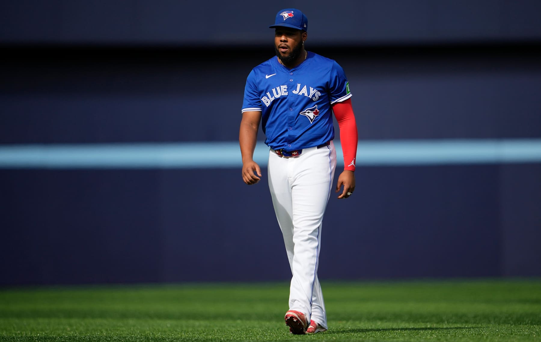 TORONTO, ON - SEPTEMBER 29: Vladimir Guerrero Jr. #27 of Toronto Blue Jays walks on the field before playing the Miami Marlins in their MLB game at the Rogers Centre on September 29, 2024 in Toronto, Ontario, Canada. (Photo by Mark Blinch/Getty Images)