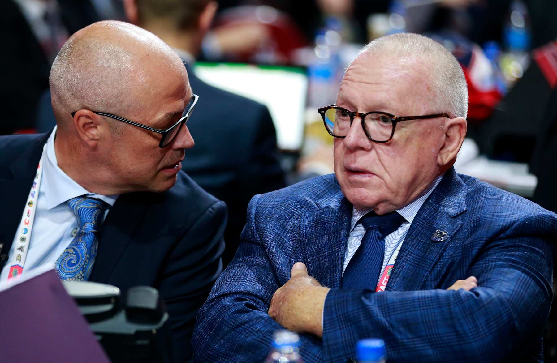 MONTREAL, QUEBEC - JULY 08: (L-R) General manager Patrik Allvin and President of hockey operations Jim Rutherford of the Vancouver Canucks look on during the 2022 Upper Deck NHL Draft at Bell Centre on July 08, 2022 in Montreal, Quebec. (Photo by Jeff Vinnick/NHLI via Getty Images)