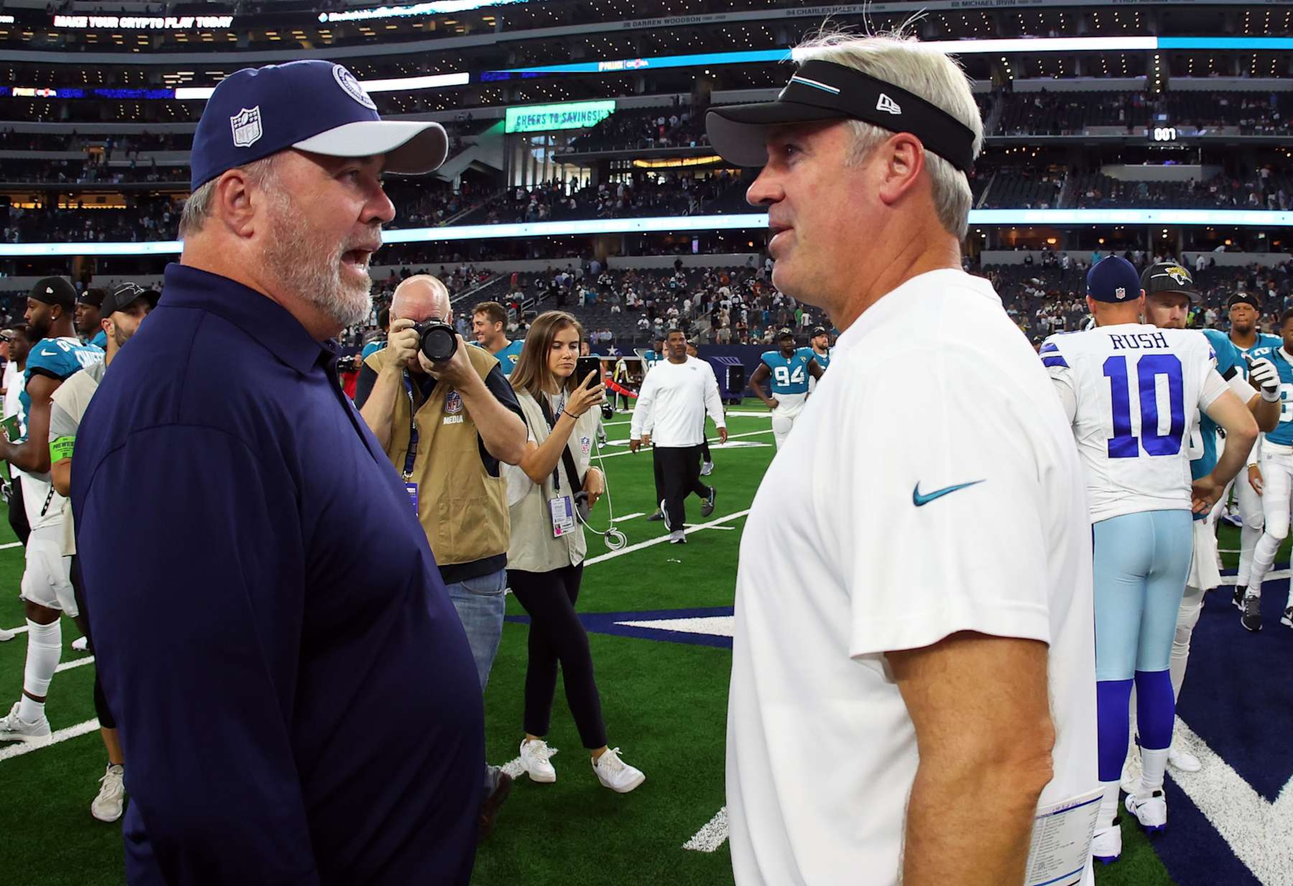 ARLINGTON, TEXAS - AUGUST 12: Mike McCarthy, head coach of the Dallas Cowboys talks with Jacksonville Jaguars head coach Doug Pederson after a preseason game at AT&T Stadium on August 12, 2023 in Arlington, Texas. (Photo by Richard Rodriguez/Getty Images) ARLINGTON, TEXAS - AUGUST 12: Mike McCarthy, head coach of the Dallas Cowboys talks with Jacksonville Jaguars head coach Doug Pederson after a preseason game at AT&T Stadium on August 12, 2023 in Arlington, Texas. (Photo by Richard Rodriguez/Getty Images)