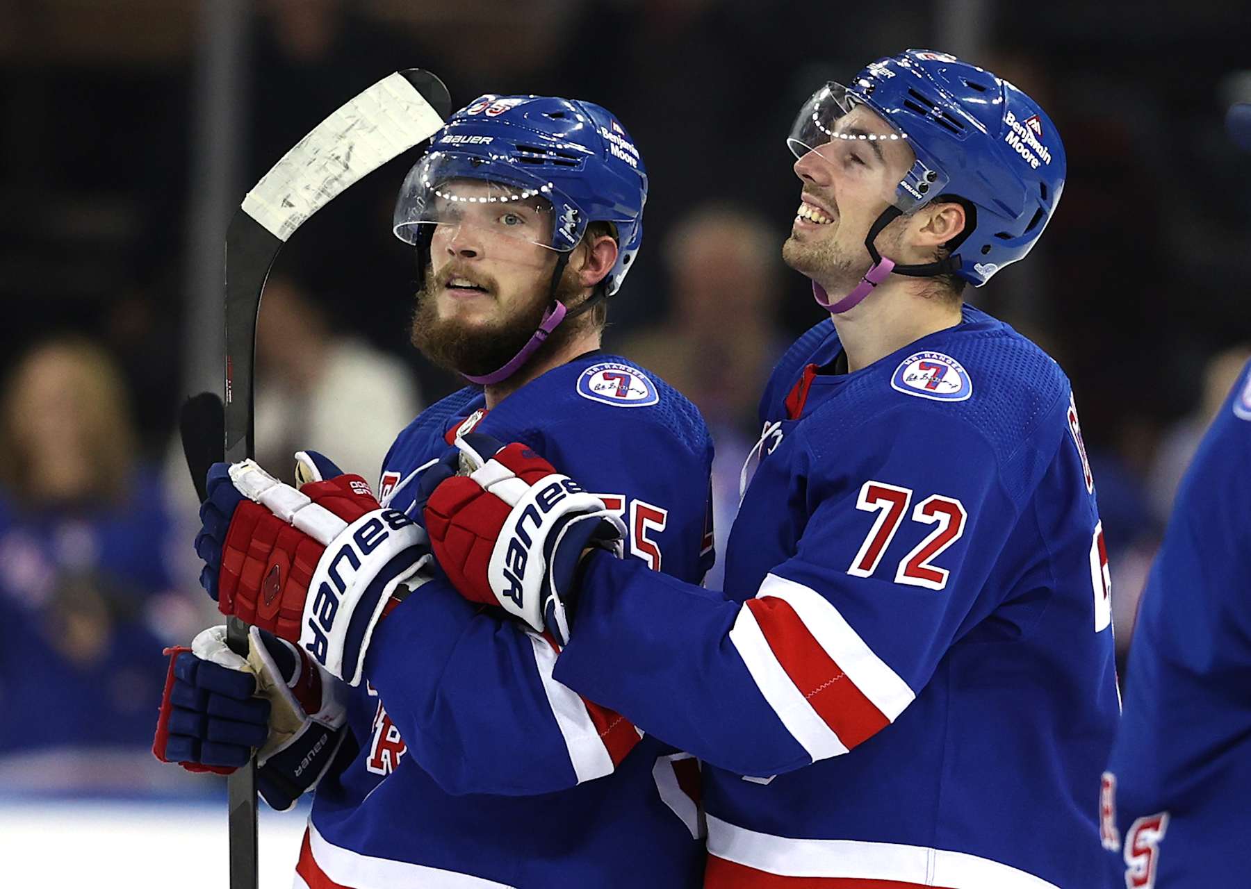 NEW YORK, NEW YORK - NOVEMBER 21:  Ryan Lindgren #55 of the New York Rangers is congratulated by teammate Filip Chytil after the win over the Buffalo Sabres at Madison Square Garden on November 21, 2021 in New York City. The New York Rangers defeated the Buffalo Sabres 5-4. Ryan Lindgren scored the game winning goal in the final second of the game.  (Photo by Elsa/Getty Images)