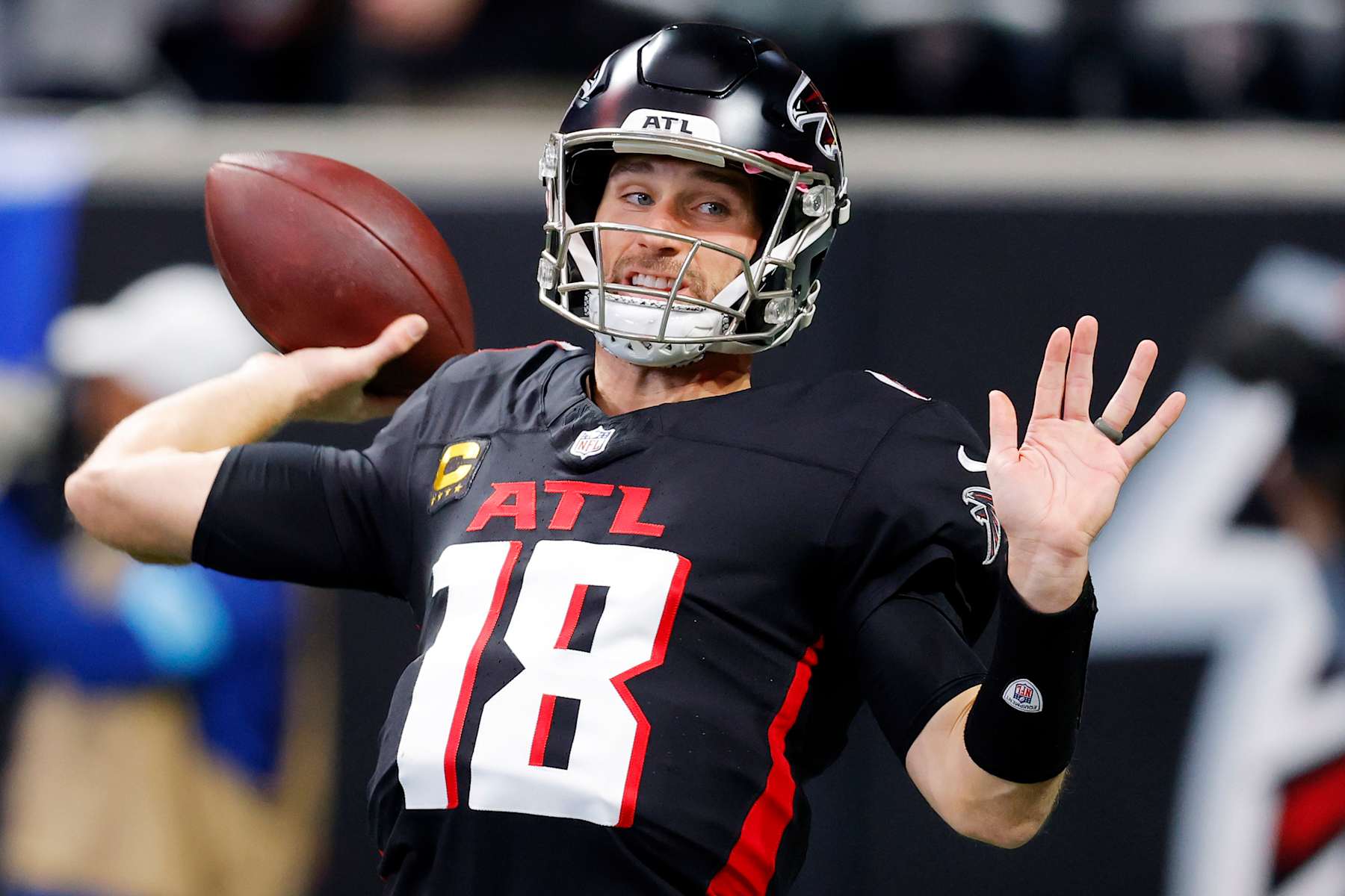 ATLANTA, GEORGIA - JANUARY 05: Kirk Cousins #18 of the Atlanta Falcons warms up before the game against the Carolina Panthers at Mercedes-Benz Stadium on January 05, 2025 in Atlanta, Georgia. (Photo by Todd Kirkland/Getty Images)
