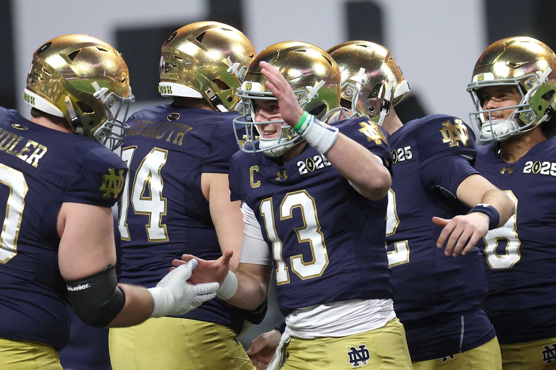 ATLANTA, GEORGIA - JANUARY 20: Riley Leonard #13 of the Notre Dame Fighting Irish looks on prior to the 2025 CFP National Championship against the Ohio State Buckeyes at the Mercedes-Benz Stadium on January 20, 2025 in Atlanta, Georgia. (Photo by Jamie Squire/Getty Images)