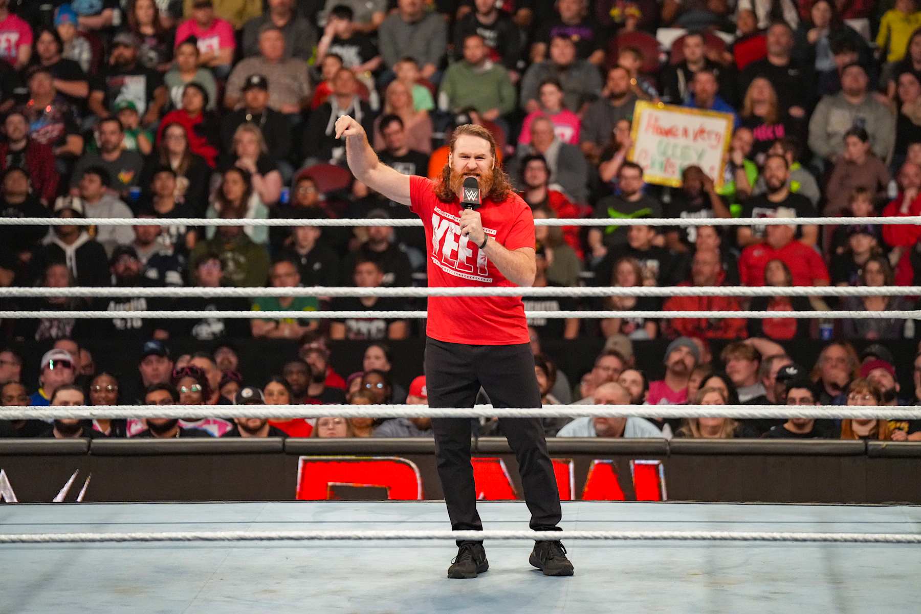 WICHITA, KANSAS - DECEMBER 09: Sami Zayn addresses the WWE Universe during Monday Night RAW at Intrust Bank Arena on December 9, 2024 in Wichita, Kansas.  (Photo by WWE/Getty Images)