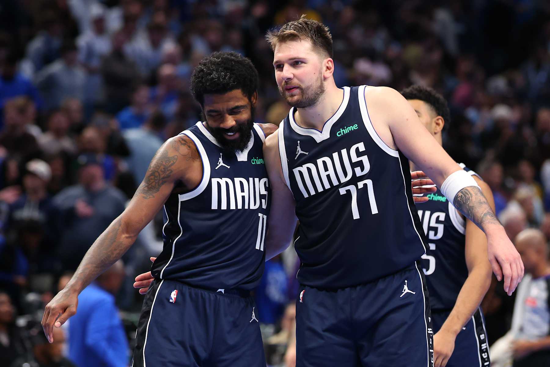 DALLAS, TEXAS - DECEMBER 03: Luka Doncic #77 of the Dallas Mavericks and Kyrie Irving #11 celebrate during the second half of an Emirates NBA Cup game against the Memphis Grizzlies at American Airlines Center on December 03, 2024 in Dallas, Texas. NOTE TO USER: User expressly acknowledges and agrees that, by downloading and/or using this photograph, user is consenting to the terms and conditions of the Getty Images License Agreement. (Photo by Sam Hodde/Getty Images)