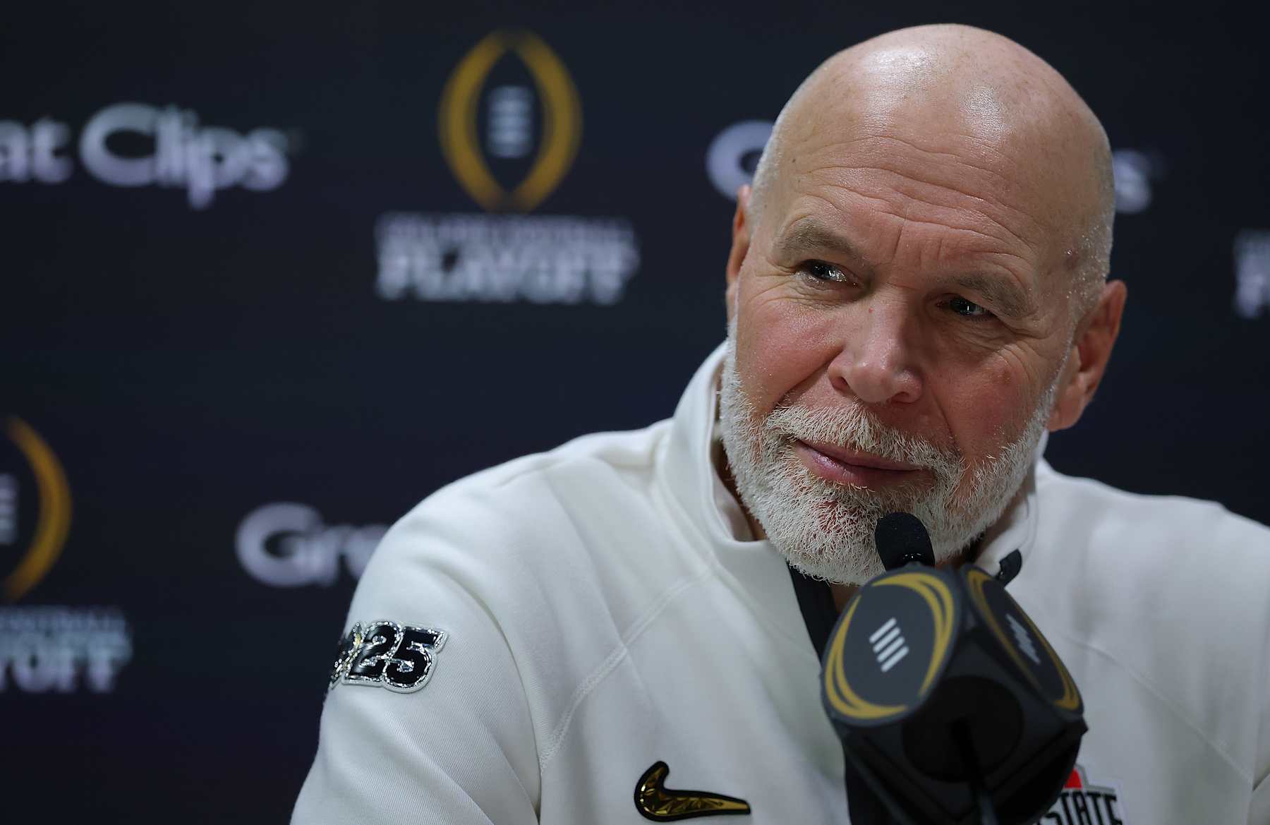ATLANTA, GEORGIA - JANUARY 18:  Defensive coordinator Jim Knowles of the Ohio State Buckeyes speaks to the media during the Ohio State Buckeyes media day at the Georgia World Congress Center prior to the 2025 CFP National Championship between the Ohio State Buckeyes and Notre Dame Fighting Irish on January 18, 2025 in Atlanta, Georgia. (Photo by Kevin C. Cox/Getty Images)