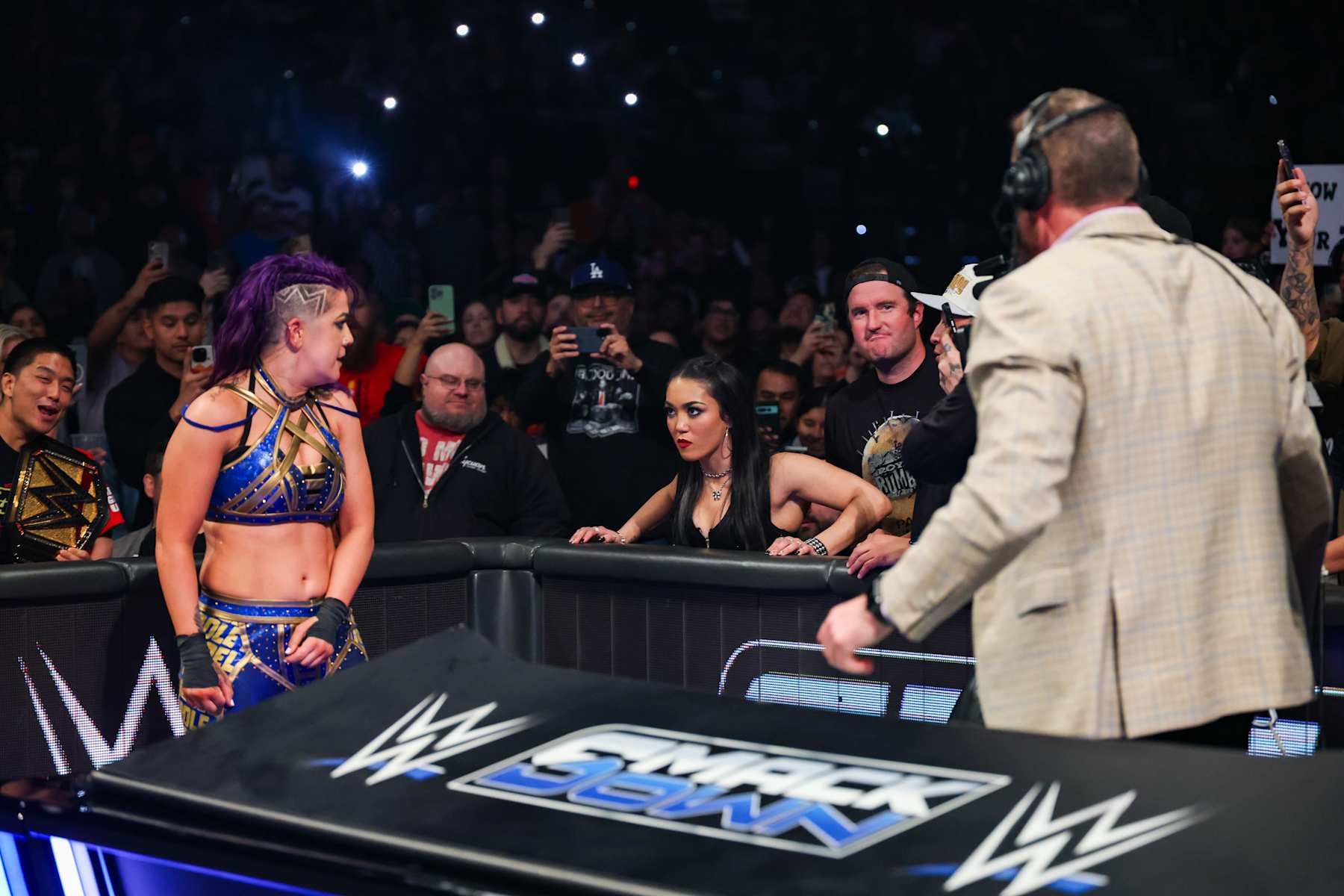 SAN DIEGO, CALIFORNIA - JANUARY 17: Roxanne Perez surprises Bayley from the stands during Smackdown at Pechanga Arena on January 17, 2025 in San Diego, California. (Photo by WWE/Getty Images) SAN DIEGO, CALIFORNIA - JANUARY 17: Roxanne Perez surprises Bayley from the stands during Smackdown at Pechanga Arena on January 17, 2025 in San Diego, California. (Photo by WWE/Getty Images)