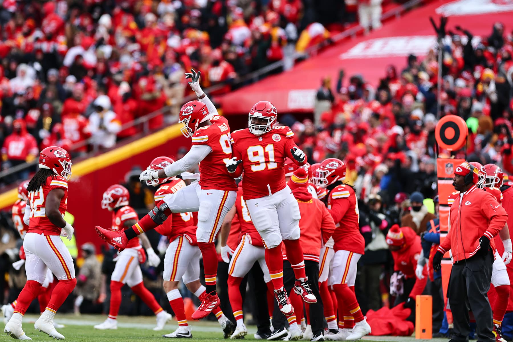 KANSAS CITY, MISSOURI - JANUARY 18: Chris Jones #95 of the Kansas City Chiefs celebrates with Derrick Nnadi #91 during the first half of the AFC Divisional playoff game against the Houston Texans at GEHA Field at Arrowhead Stadium on January 18, 2025 in Kansas City, Missouri. (Photo by Aaron M. Sprecher/Getty Images)