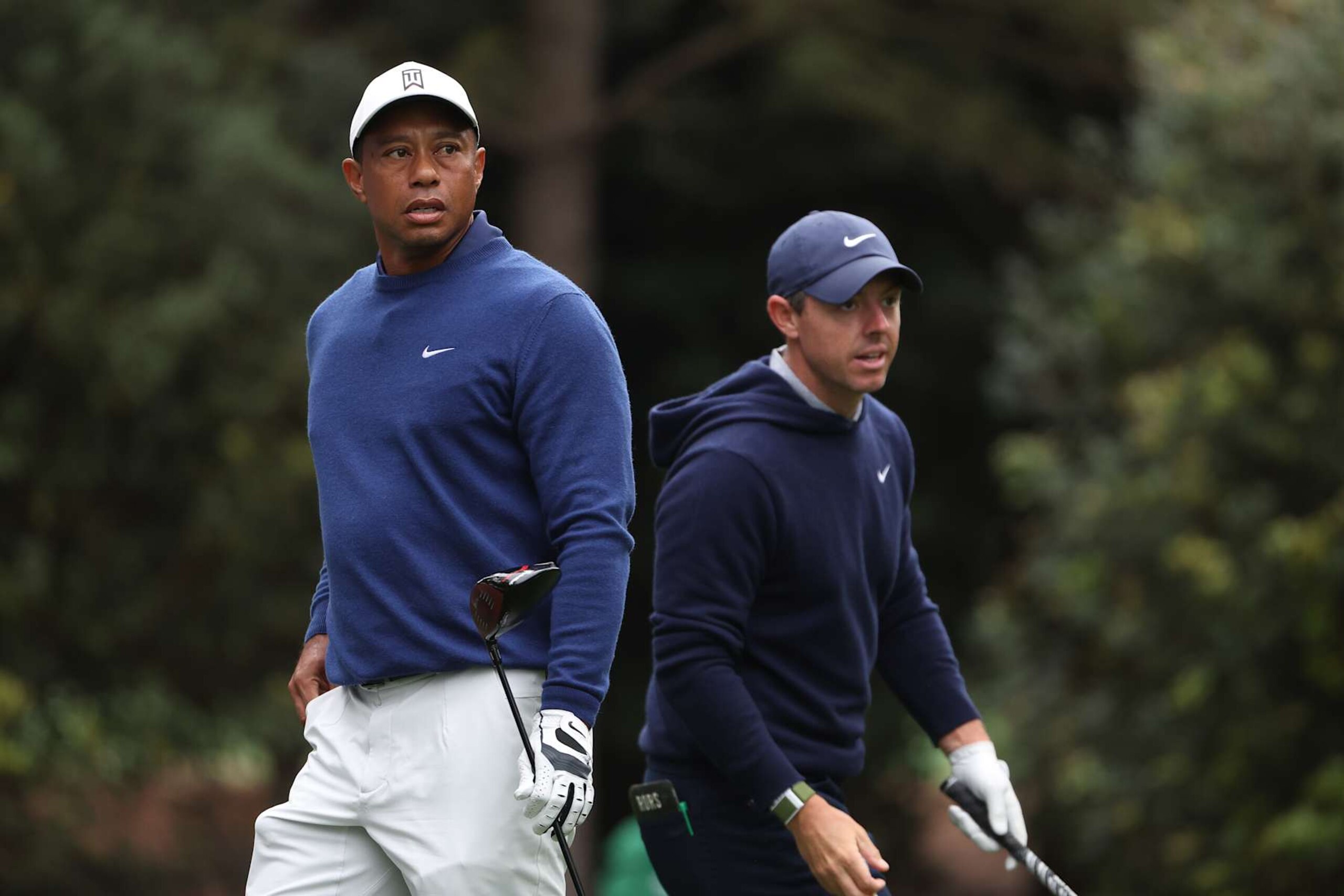 AUGUSTA, GEORGIA - APRIL 03: Tiger Woods of the United States and Rory McIlroy of Northern Ireland look on from the 11th tee during a practice round prior to the 2023 Masters Tournament at Augusta National Golf Club on April 03, 2023 in Augusta, Georgia. (Photo by Christian Petersen/Getty Images) AUGUSTA, GEORGIA - APRIL 03: Tiger Woods of the United States and Rory McIlroy of Northern Ireland look on from the 11th tee during a practice round prior to the 2023 Masters Tournament at Augusta National Golf Club on April 03, 2023 in Augusta, Georgia. (Photo by Christian Petersen/Getty Images)