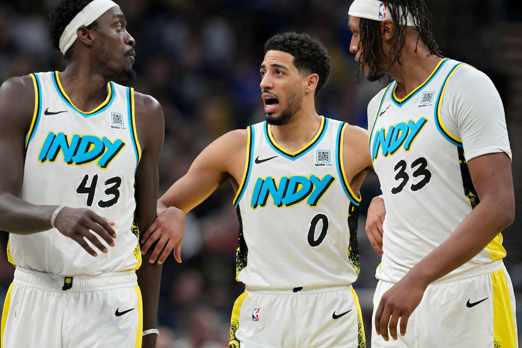 INDIANAPOLIS, INDIANA - DECEMBER 26: Tyrese Haliburton (C) #0 of the Indiana Pacers speaks with teammates Pascal Siakam (L) #43 and Myles Turner (R) #33 during the second half of an NBA basketball game against the Oklahoma City Thunder at Gainbridge Fieldhouse on December 26, 2024 in Indianapolis, Indiana. NOTE TO USER: User expressly acknowledges and agrees that, by downloading and or using this Photograph, user is consenting to the terms and conditions of the Getty Images License Agreement. (Photo by Jeff Dean/Getty Images)