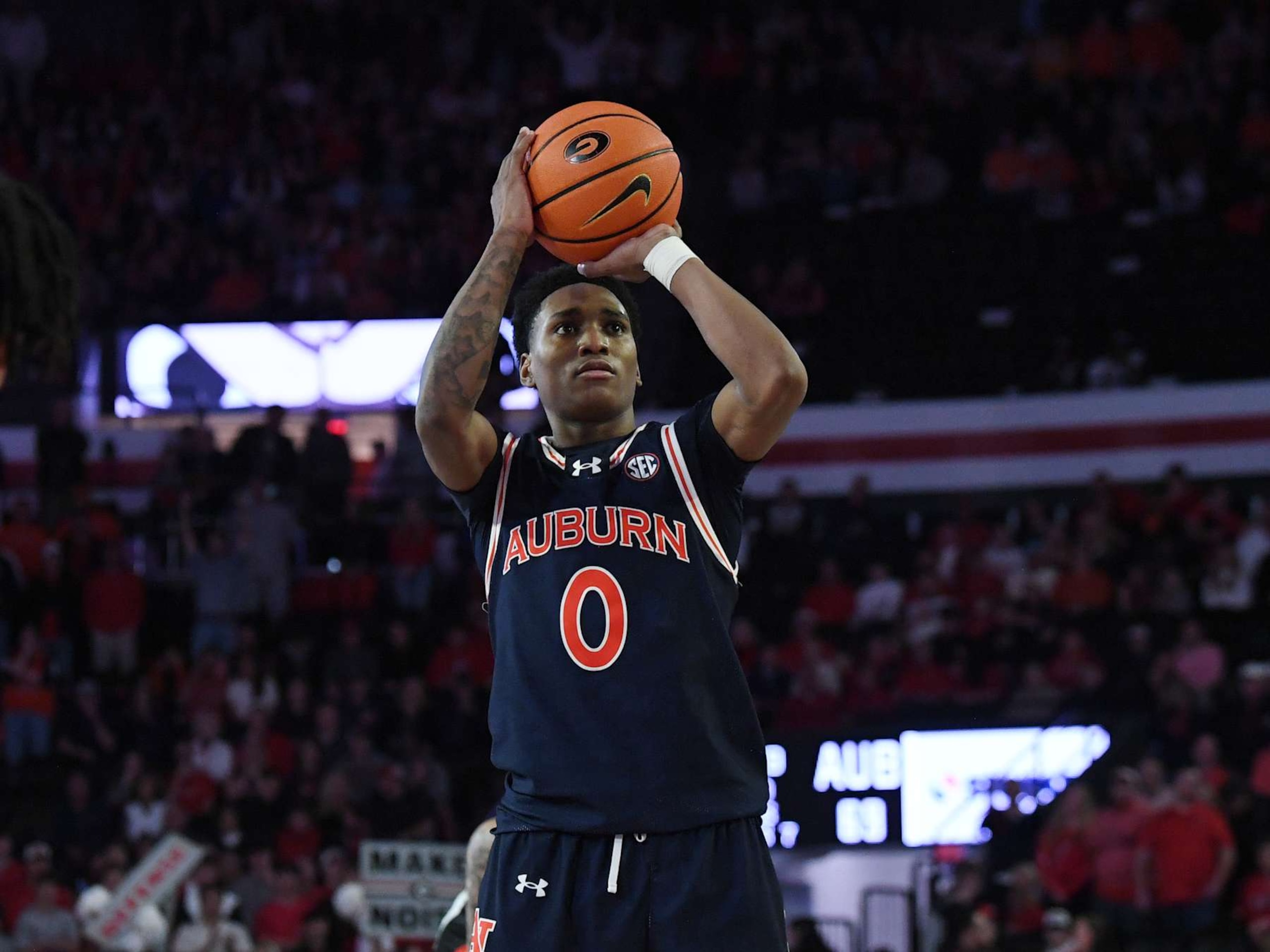 ATHENS, GA - JANUARY 18: Auburn Tigers guard Tahaad Pettiford (0) shoots a free throw during the college basketball game between the Auburn Tigers and the Georgia Bulldogs on January 18, 2025, at Stegeman Coliseum in Athens, GA. (Photo by Jeffrey Vest/Icon Sportswire via Getty Images)