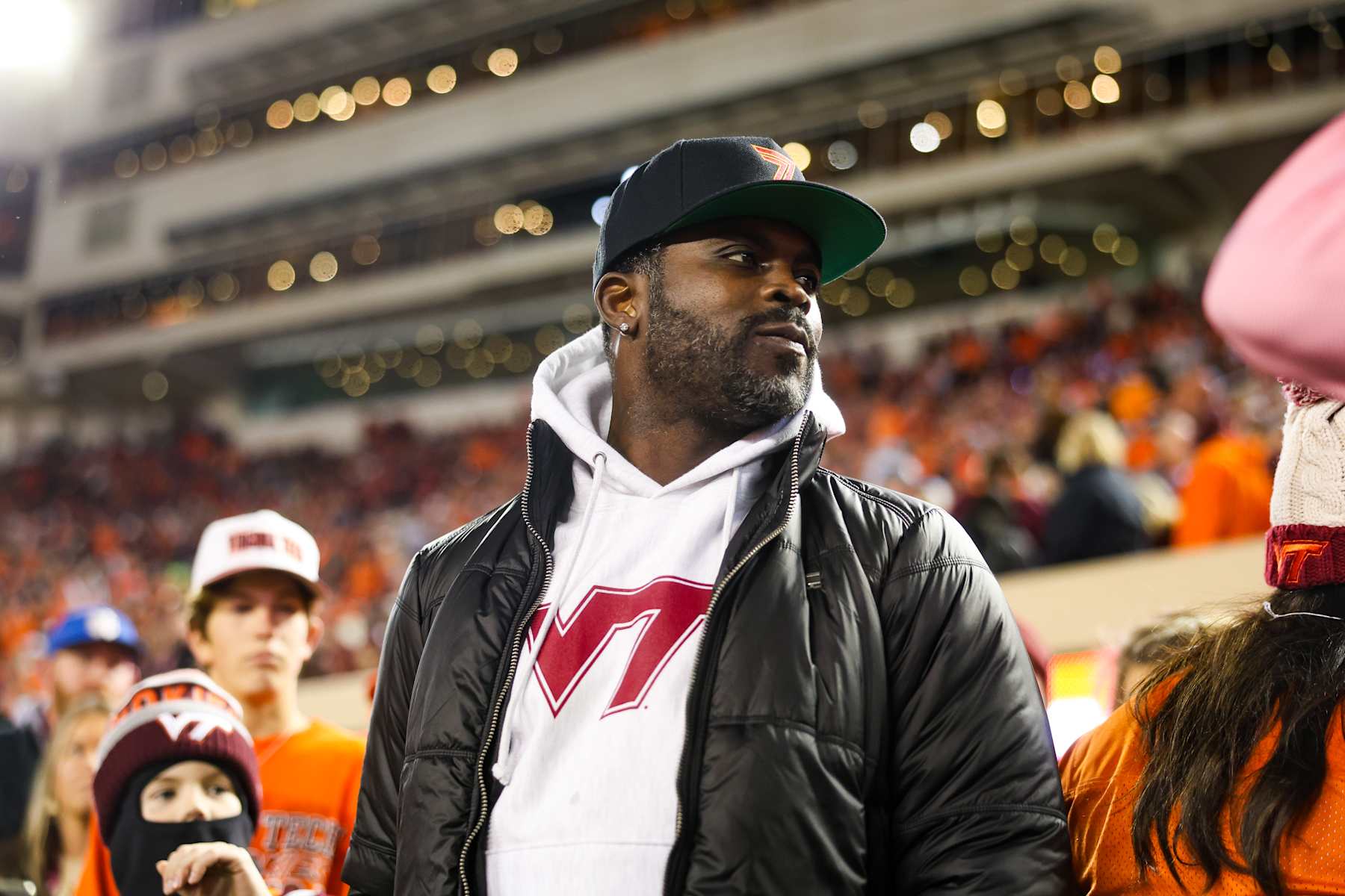 BLACKSBURG, VIRGINIA - OCTOBER 17: Michael Vick looks on prior to a game between the Virginia Tech Hokies and the Boston College Eagles at Lane Stadium on October 17, 2024 in Blacksburg, Virginia. (Photo by Ryan Hunt/Getty Images) BLACKSBURG, VIRGINIA - OCTOBER 17: Michael Vick looks on prior to a game between the Virginia Tech Hokies and the Boston College Eagles at Lane Stadium on October 17, 2024 in Blacksburg, Virginia. (Photo by Ryan Hunt/Getty Images)