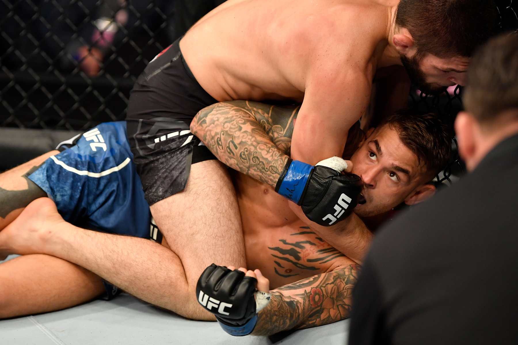 Khabib Nurmagomedov wrestles Dustin Poirier