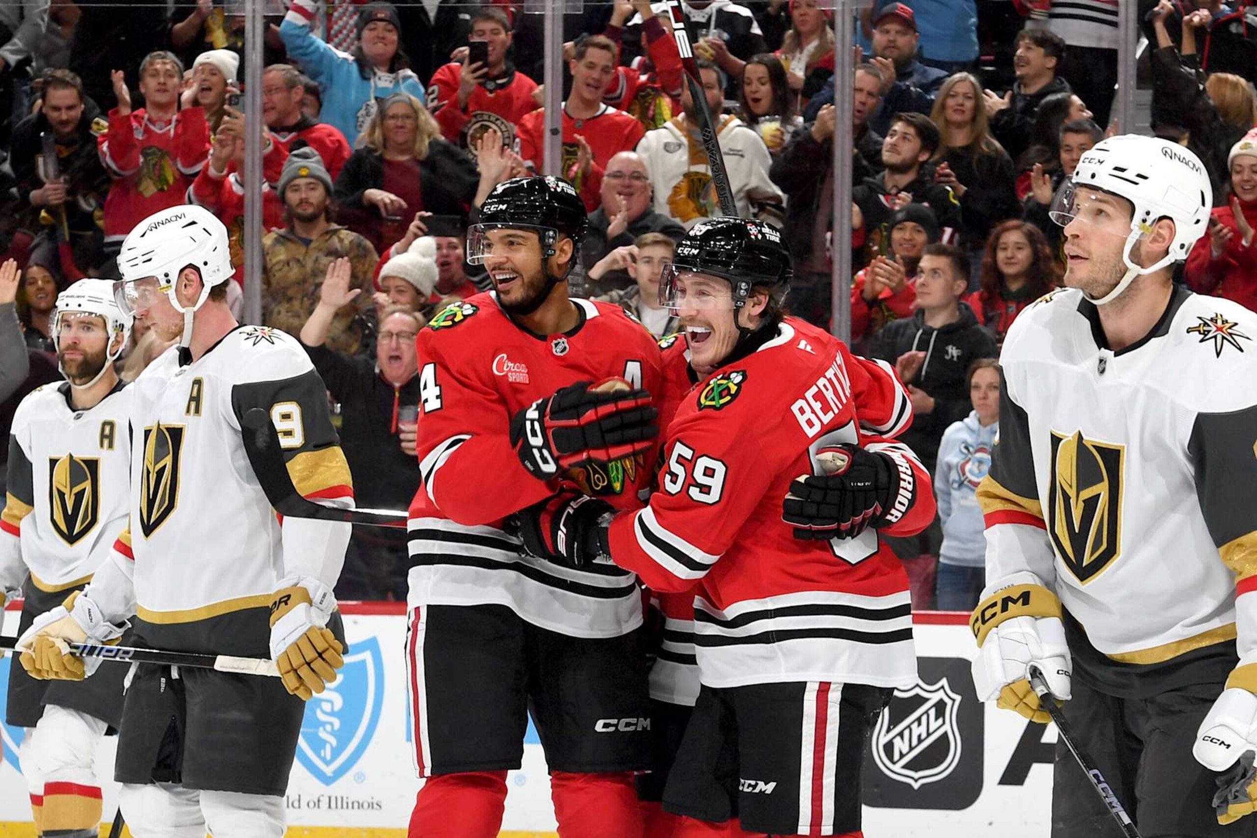 CHICAGO, ILLINOIS - JANUARY 18: Seth Jones #4 and Tyler Bertuzzi #59 of the Chicago Blackhawks react after Bertuzzi scores against the Vegas Golden Knights in the third period at the United Center on January 18, 2025 in Chicago, Illinois. (Photo by Bill Smith/NHLI via Getty Images) CHICAGO, ILLINOIS - JANUARY 18: Seth Jones #4 and Tyler Bertuzzi #59 of the Chicago Blackhawks react after Bertuzzi scores against the Vegas Golden Knights in the third period at the United Center on January 18, 2025 in Chicago, Illinois. (Photo by Bill Smith/NHLI via Getty Images)