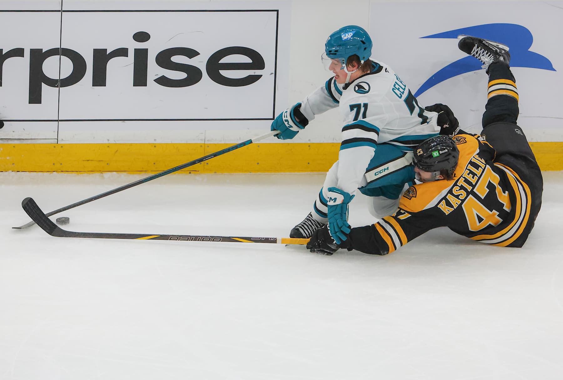 Boston, MA - January 20: Boston Bruins C Mark Kastelic  defends San Jose Sharks C Macklin Celebrini in the second period. (Photo by Matthew J. Lee/The Boston Globe via Getty Images)