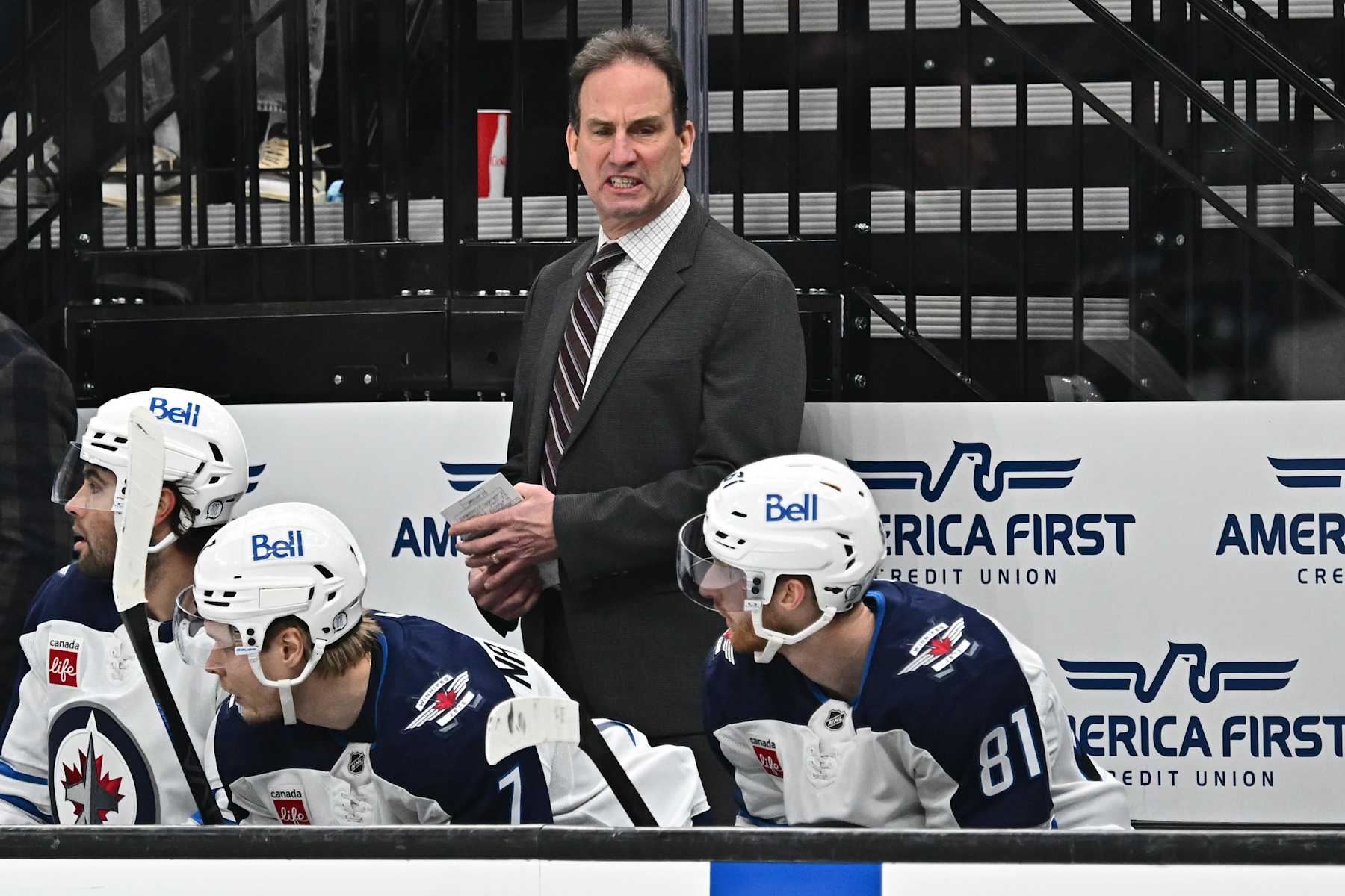 SALT LAKE CITY, UTAH - JANUARY 20:  Head Coach Scott Arniel of the Winnipeg Jets talks to his team on the bench during the second period against the Utah Hockey Club on January 20, 2025 at Delta Center in Salt Lake City, Utah. (Photo by Jamie Sabau/NHLI via Getty Images)