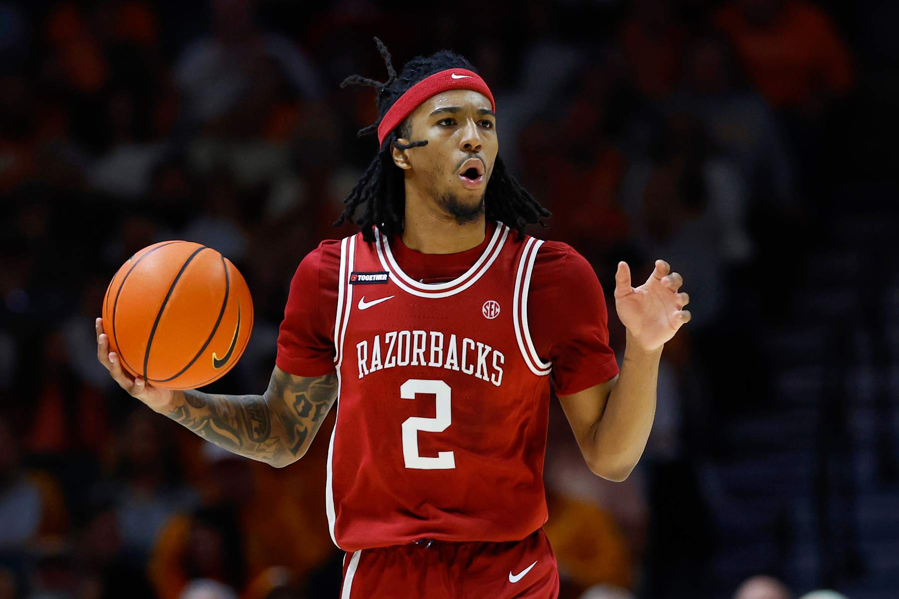 KNOXVILLE, TENNESSEE - JANUARY 04: Boogie Fland #2 of the Arkansas Razorbacks reacts to a play during the first half of the game against the Tennessee Volunteers at Thompson-Boling Arena on January 04, 2025 in Knoxville, Tennessee.  (Photo by Johnnie Izquierdo/Getty Images)