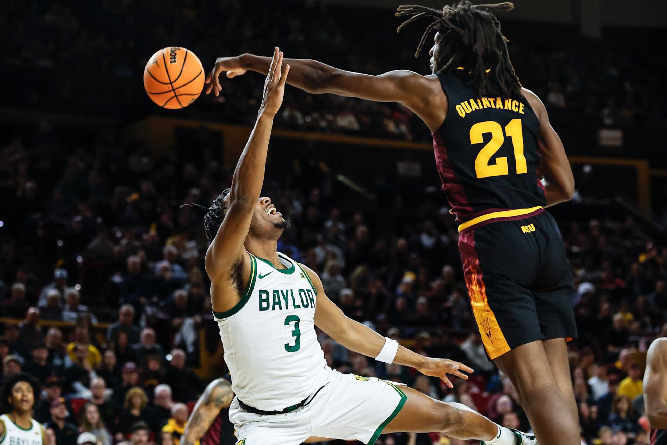 TEMPE, AZ - JANUARY 11  Arizona State Sun Devils forward Jayden Quaintance (21) blocks the shot of Baylor Bears guard Jeremy Roach (3) during the college basketball game between the Baylor Bears and the Arizona State Sun Devils on January 11, 2025 at Desert Financial Arena in Tempe, Arizona. (Photo by Kevin Abele/Icon Sportswire via Getty Images)