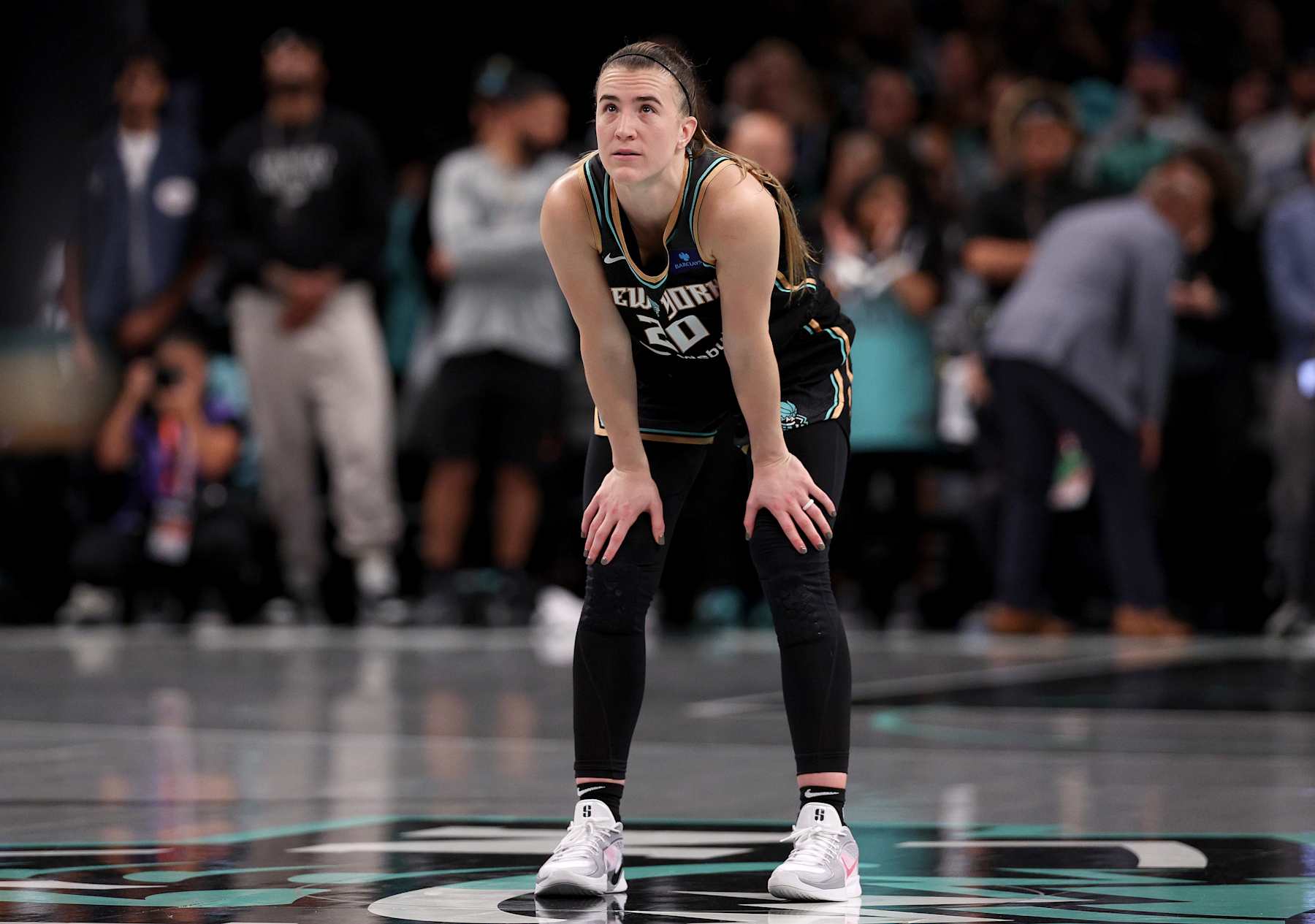 NEW YORK, NEW YORK - OCTOBER 20: Sabrina Ionescu #20 of the New York Liberty reacts in the fourth quarter against the Minnesota Lynx during Game Five of the WNBA Finals at Barclays Center on October 20, 2024 in the Brooklyn borough of New York City. The New York Liberty defeated the Minnesota Lynx 67-62 in overtime to win the championship. NOTE TO USER: User expressly acknowledges and agrees that, by downloading and or using this photograph, User is consenting to the terms and conditions of the Getty Images License Agreement. (Photo by Elsa/Getty Images)