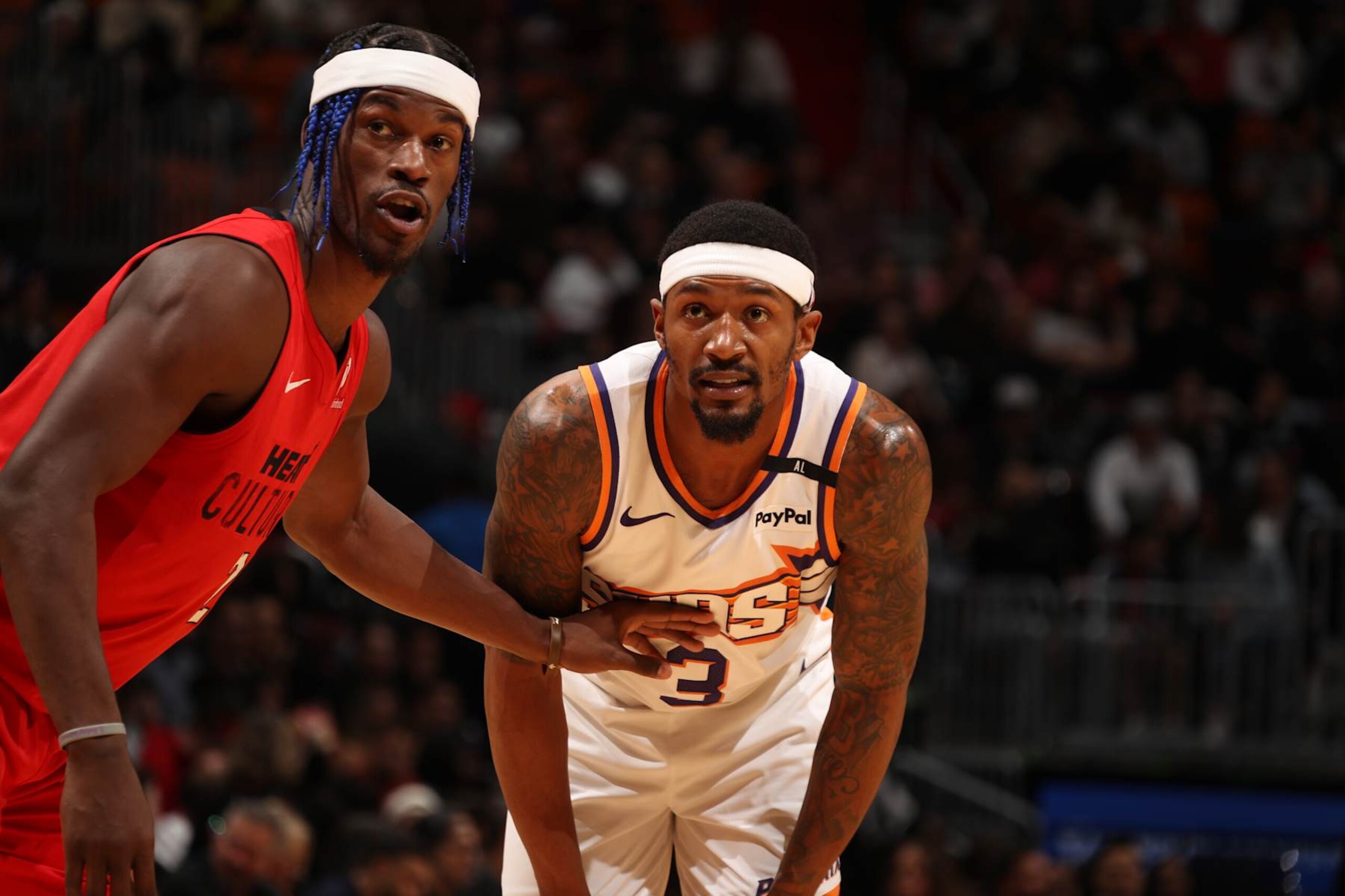 MIAMI, FL - DECEMBER 7: Bradley Beal #3 of the Phoenix Suns and Jimmy Butler #22 of the Miami Heat look on during the game between the against the Phoenix Suns against the Miami Heat on December 7, 2024 at Kaseya Center in Miami, Florida. NOTE TO USER: User expressly acknowledges and agrees that, by downloading and or using this Photograph, user is consenting to the terms and conditions of the Getty Images License Agreement. Mandatory Copyright Notice: Copyright 2024 NBAE (Photo by Issac Baldizon/NBAE via Getty Images) MIAMI, FL - DECEMBER 7: Bradley Beal #3 of the Phoenix Suns and Jimmy Butler #22 of the Miami Heat look on during the game between the against the Phoenix Suns against the Miami Heat on December 7, 2024 at Kaseya Center in Miami, Florida. NOTE TO USER: User expressly acknowledges and agrees that, by downloading and or using this Photograph, user is consenting to the terms and conditions of the Getty Images License Agreement. Mandatory Copyright Notice: Copyright 2024 NBAE (Photo by Issac Baldizon/NBAE via Getty Images)