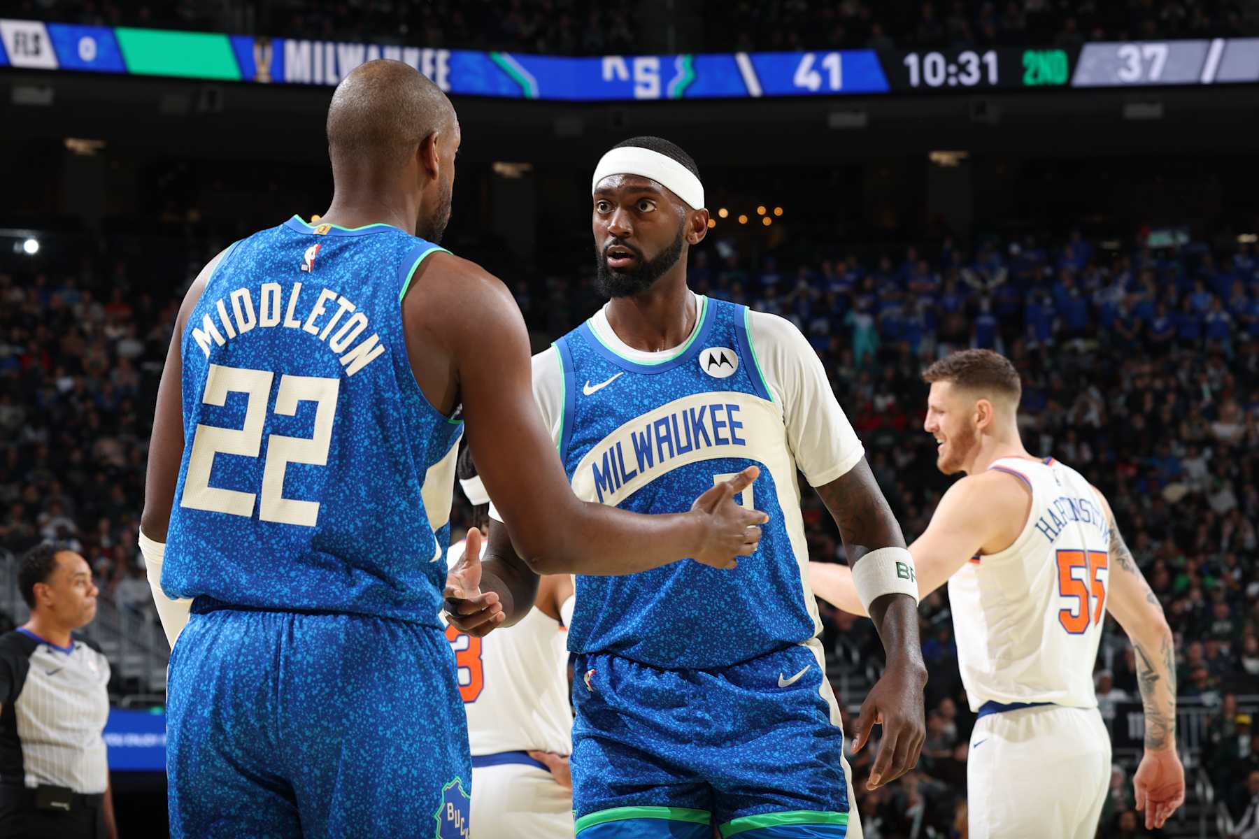MILWAUKEE, WI - DECEMBER 5: Bobby Portis #9 and Khris Middleton #22 of the Milwaukee Bucks high five during the game against the New York Knicks during the In-Season Tournament Quarterfinals on December 5, 2023 at Fiserv Forum in Milwaukee, Wisconsin. NOTE TO USER: User expressly acknowledges and agrees that, by downloading and or using this photograph, User is consenting to the terms and conditions of the Getty Images License Agreement. Mandatory Copyright Notice: Copyright 2023 NBAE (Photo by Jeff Haynes/NBAE via Getty Images)