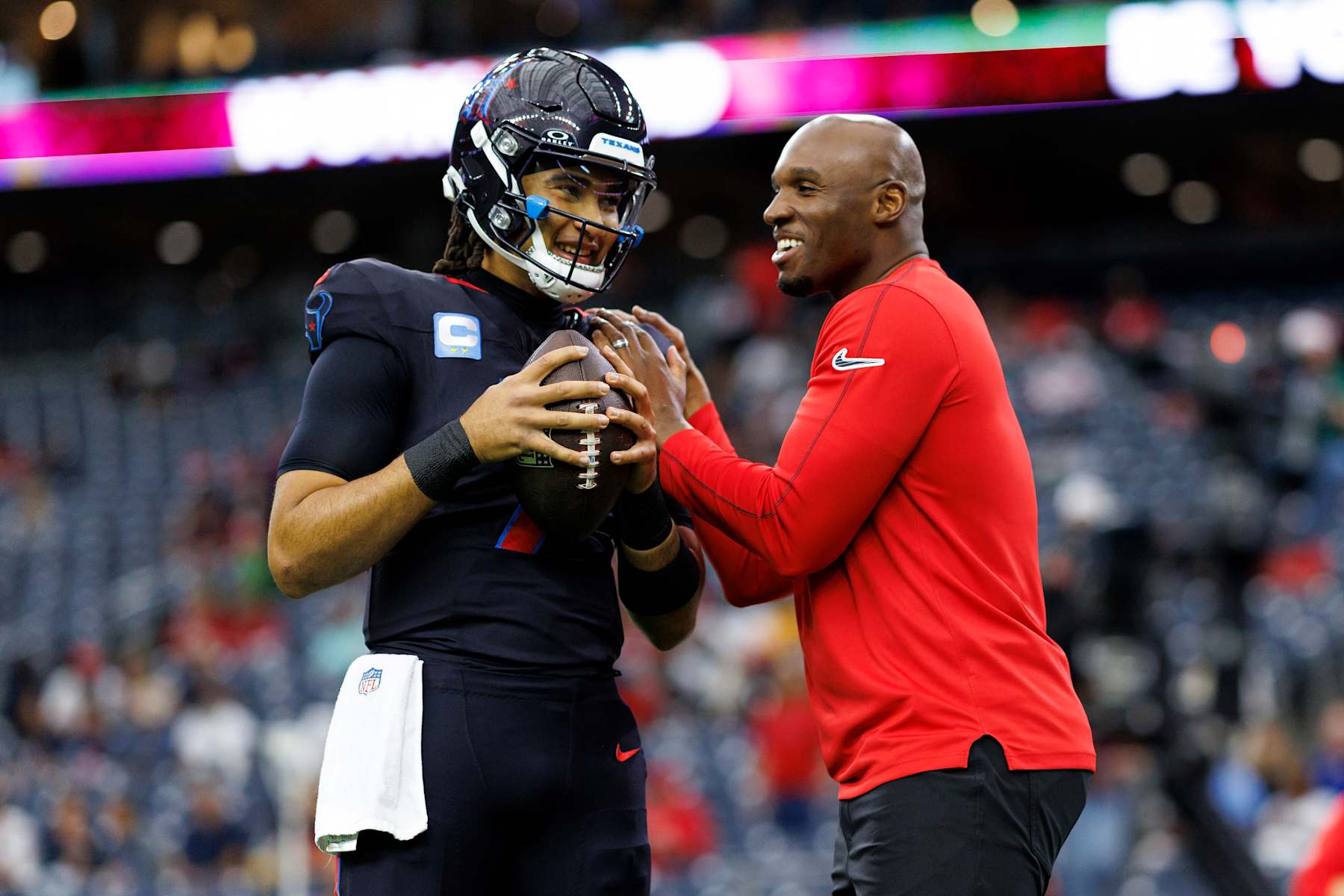 HOUSTON, TEXAS - DECEMBER 25: Quarterback C.J. Stroud #7 of the Houston Texans stands on the field with head coach DeMeco Ryans prior to an NFL football game against the Baltimore Ravens, at NRG Stadium on December 25, 2024 in Houston, Texas. (Photo by Brooke Sutton/Getty Images)