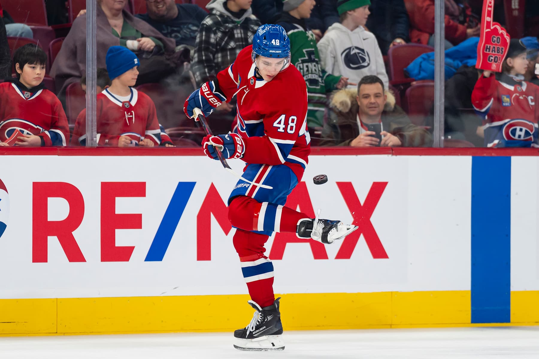 MONTREAL, CANADA - JANUARY 21: Lane Hutson #48 of the Montreal Canadiens juggles the puck on his skate before the game against the Tampa Bay Lightning at the Bell Centre on January 21, 2025 in Montreal, Quebec, Canada.  (Photo by Arianne Bergeron/NHLI via Getty Images)