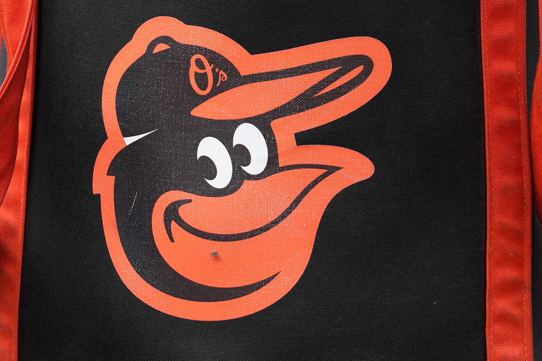 BALTIMORE, MD - JULY 12:  The Baltimore Orioles logo shown on a  ball bag on the field during batting practice prior to a baseball game against the New York Yankees at the Oriole Park at Camden Yards on July 12, 2024 in Baltimore, Maryland.  (Photo by Mitchell Layton/Getty Images)
