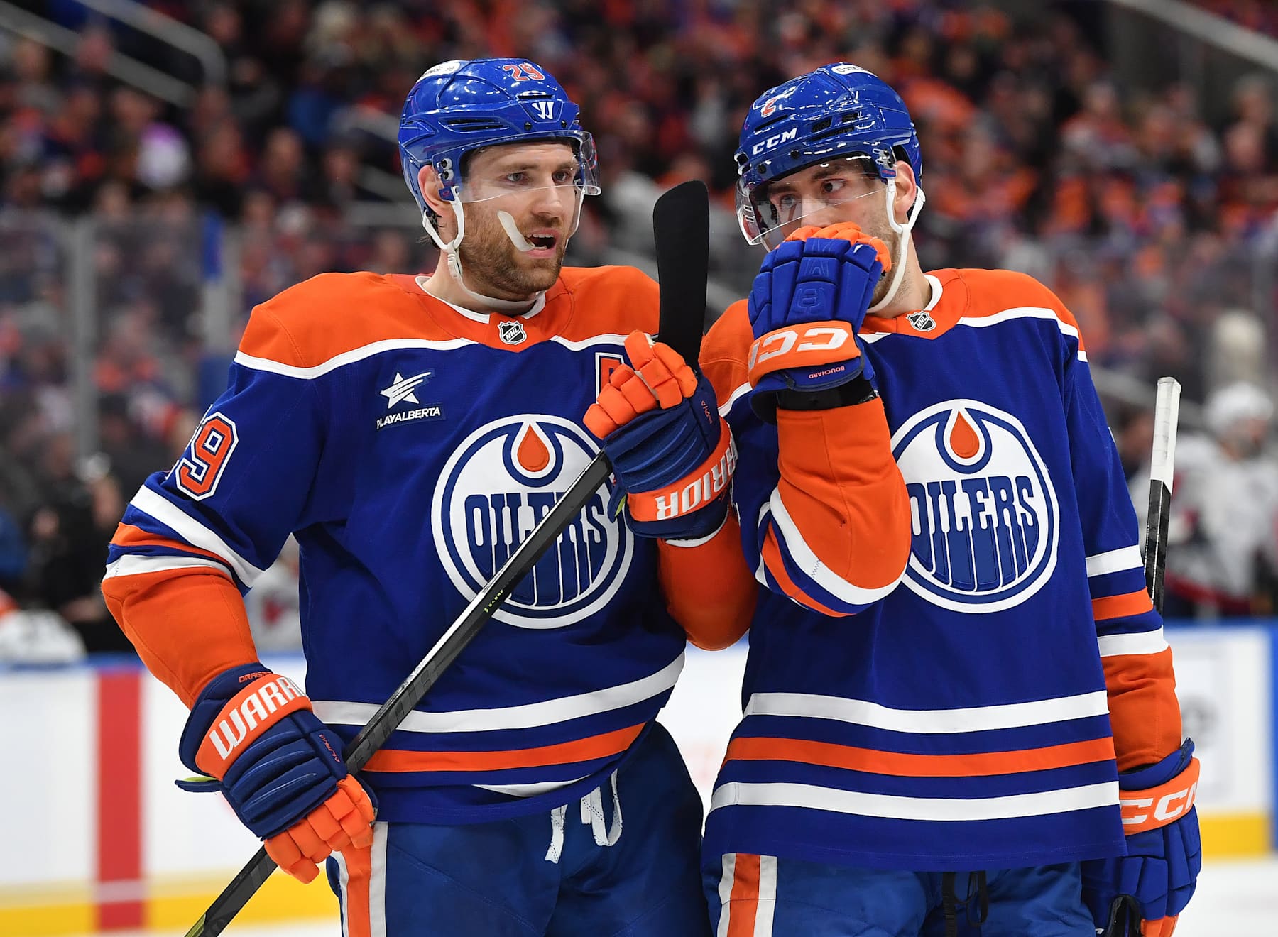 EDMONTON, CANADA - JANUARY 21: Leon Draisaitl #29 and Evan Bouchard #2 of the Edmonton Oilers have a conversation during a stoppage in play in the second period of the game against the Washington Capitals at Rogers Place on January 21, 2025, in Edmonton, Alberta, Canada. (Photo by Andy Devlin/NHLI via Getty Images)