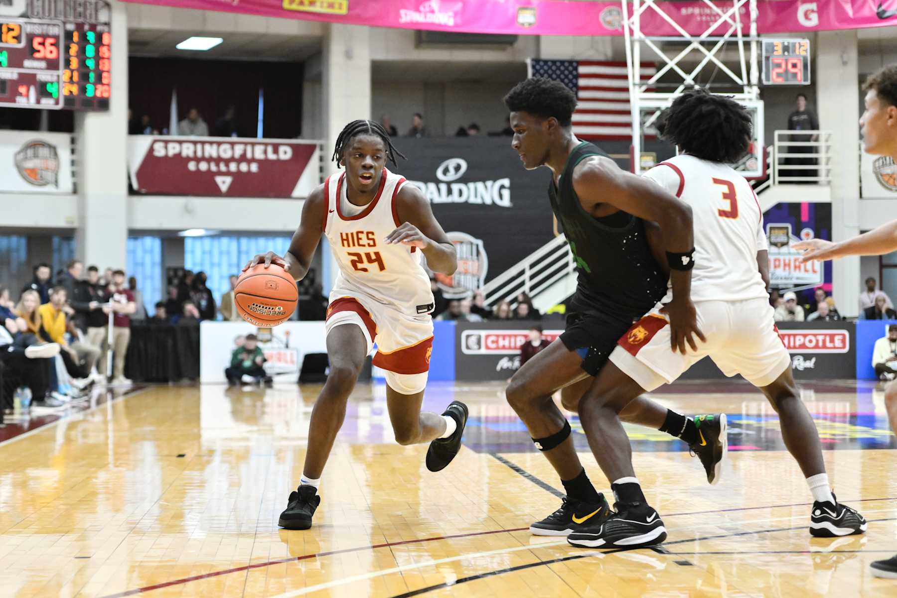 SPRINGFIELD, MA - JANUARY 18: Caleb Wilson of Holy Innocents (24) drives to the basket while being defended by Tounde Yessoufou of St. Joseph (24) during the Spalding Hoophall Classic high school basketball game between Holy Innocents School and St. Joseph on January 18, 2025 at Blake Arena in Springfield, MA (Photo by John Jones/Icon Sportswire via Getty Images)