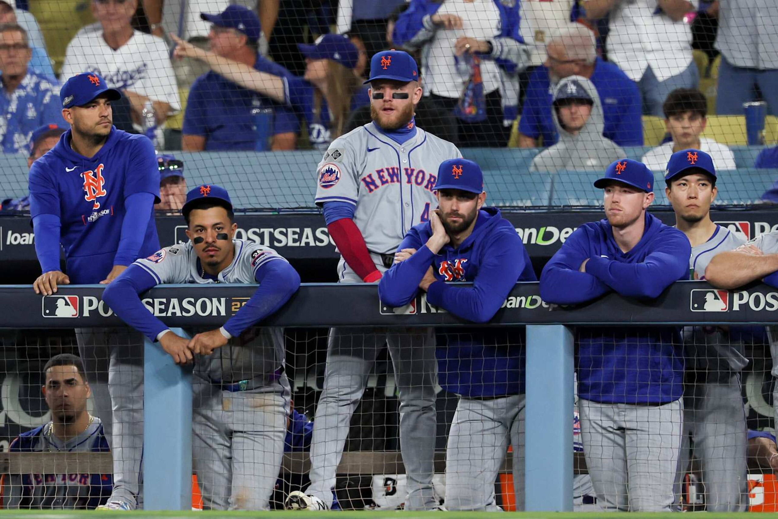 LOS ANGELES, CALIFORNIA - OCTOBER 20: The New York Mets watch from the dugout during the ninth inning in game six of the National League Championship Series against the Los Angeles Dodgers at Dodger Field on Sunday, Oct. 20, 2024 in Los Angeles. (Robert Gauthier / Los Angeles Times via Getty Images)