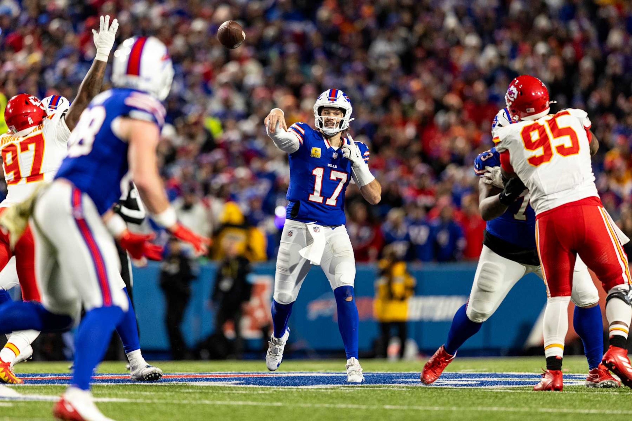 ORCHARD PARK, NEW YORK - NOVEMBER 17: Josh Allen #17 of the Buffalo Bills throws a pass during the fourth quarter of the game against the Kansas City Chiefs at Highmark Stadium on November 17, 2024 in Orchard Park, New York. The Bills beat the Chiefs 30-21. (Photo by Lauren Leigh Bacho/Getty Images) ORCHARD PARK, NEW YORK - NOVEMBER 17: Josh Allen #17 of the Buffalo Bills throws a pass during the fourth quarter of the game against the Kansas City Chiefs at Highmark Stadium on November 17, 2024 in Orchard Park, New York. The Bills beat the Chiefs 30-21. (Photo by Lauren Leigh Bacho/Getty Images)