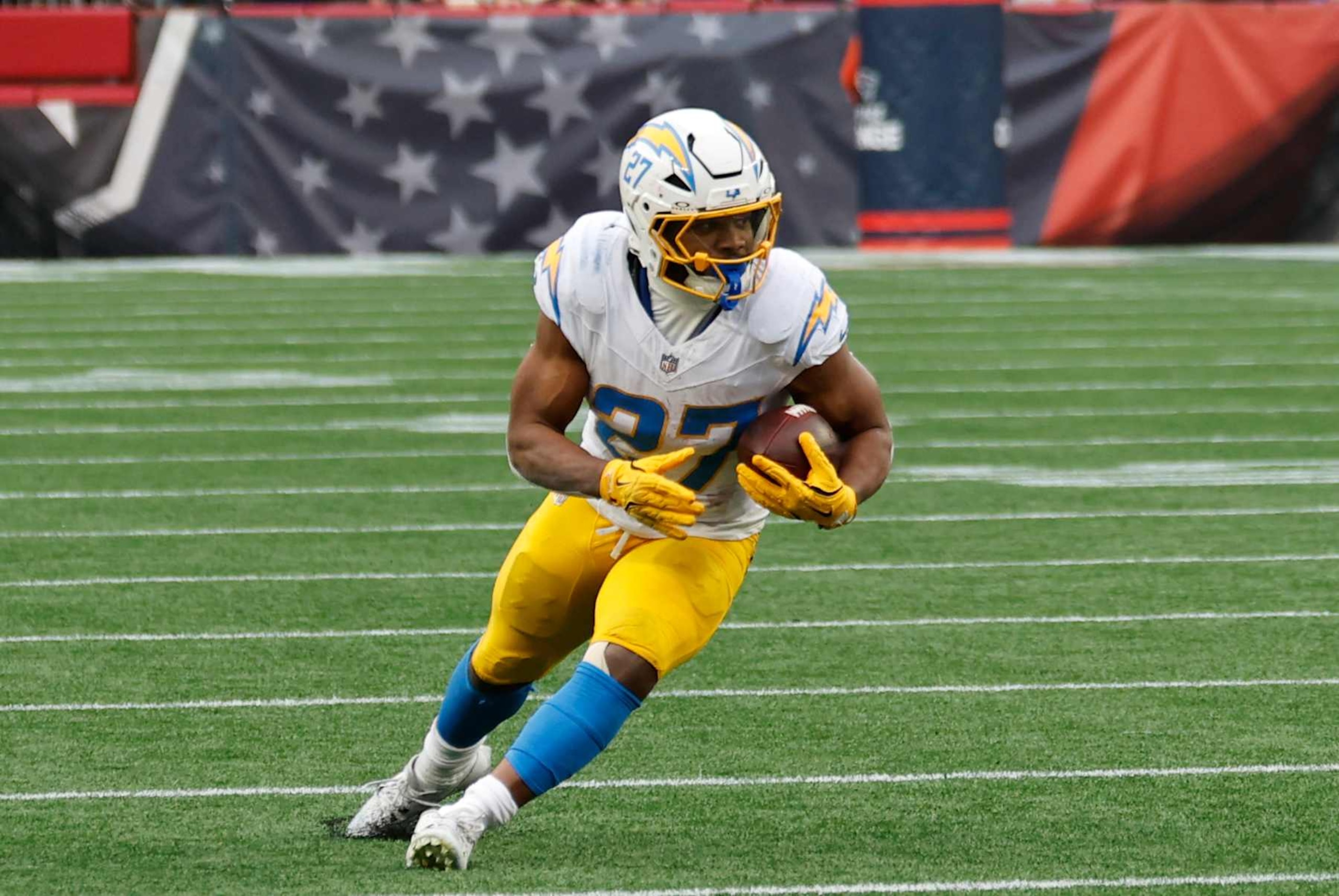 FOXBOROUGH, MA - DECEMBER 28: Los Angeles Chargers running back J.K. Dobbins (27) turns up field after catch during a game between the New England Patriots and the Los Angeles Chargers on December 28, 2024, at Gillette Stadium in Foxborough, Massachusetts. (Photo by Fred Kfoury III/Icon Sportswire via Getty Images) FOXBOROUGH, MA - DECEMBER 28: Los Angeles Chargers running back J.K. Dobbins (27) turns up field after catch during a game between the New England Patriots and the Los Angeles Chargers on December 28, 2024, at Gillette Stadium in Foxborough, Massachusetts. (Photo by Fred Kfoury III/Icon Sportswire via Getty Images)