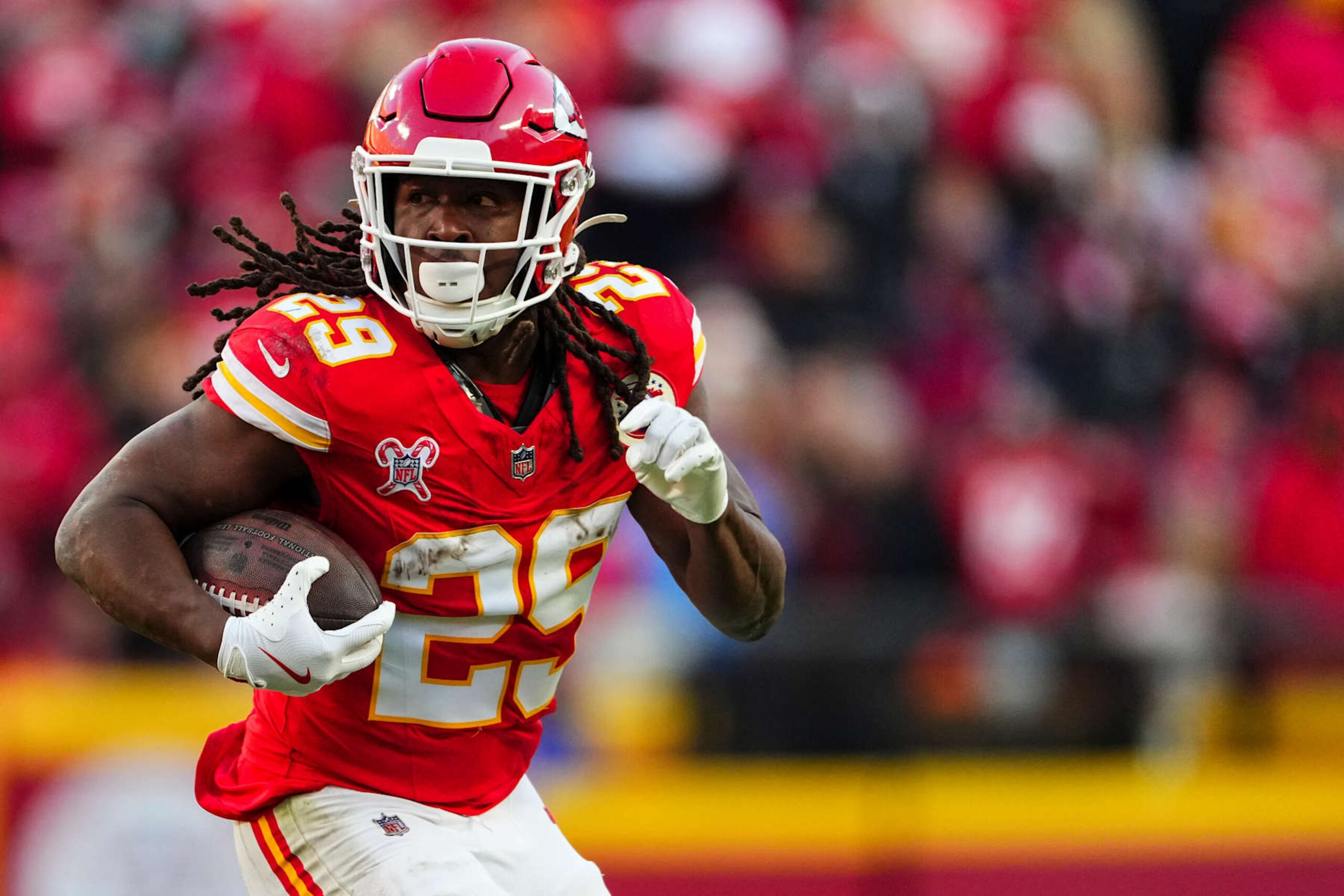 KANSAS CITY, MO - DECEMBER 21: Kareem Hunt #29 of the Kansas City Chiefs runs the ball during an NFL football game against the Houston Texans at GEHA Field at Arrowhead Stadium on December 21, 2024 in Kansas City, Missouri. (Photo by Cooper Neill/Getty Images) KANSAS CITY, MO - DECEMBER 21: Kareem Hunt #29 of the Kansas City Chiefs runs the ball during an NFL football game against the Houston Texans at GEHA Field at Arrowhead Stadium on December 21, 2024 in Kansas City, Missouri. (Photo by Cooper Neill/Getty Images)