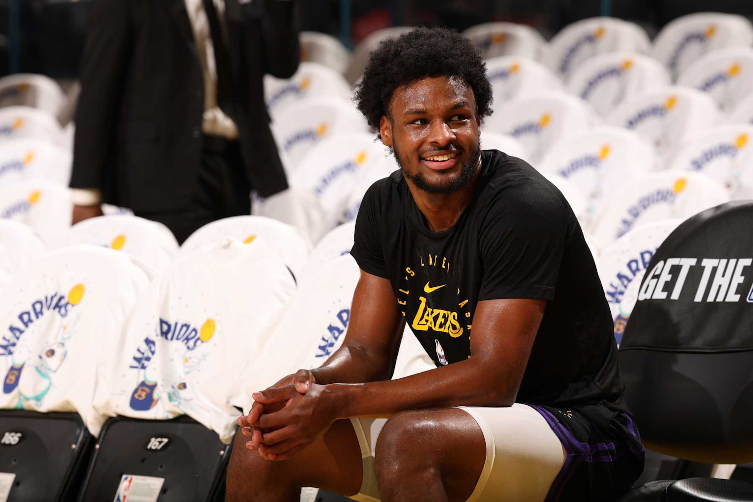 SAN FRANCISCO, CA - DECEMBER 25: Bronny James #9 of the Los Angeles Lakers looks on before the game against the Golden State Warriors on December 25, 2024 at Chase Center in San Francisco, California. NOTE TO USER: User expressly acknowledges and agrees that, by downloading and or using this photograph, user is consenting to the terms and conditions of Getty Images License Agreement. Mandatory Copyright Notice: Copyright 2024 NBAE (Photo by Jed Jacobsohn/NBAE via Getty Images) SAN FRANCISCO, CA - DECEMBER 25: Bronny James #9 of the Los Angeles Lakers looks on before the game against the Golden State Warriors on December 25, 2024 at Chase Center in San Francisco, California. NOTE TO USER: User expressly acknowledges and agrees that, by downloading and or using this photograph, user is consenting to the terms and conditions of Getty Images License Agreement. Mandatory Copyright Notice: Copyright 2024 NBAE (Photo by Jed Jacobsohn/NBAE via Getty Images)
