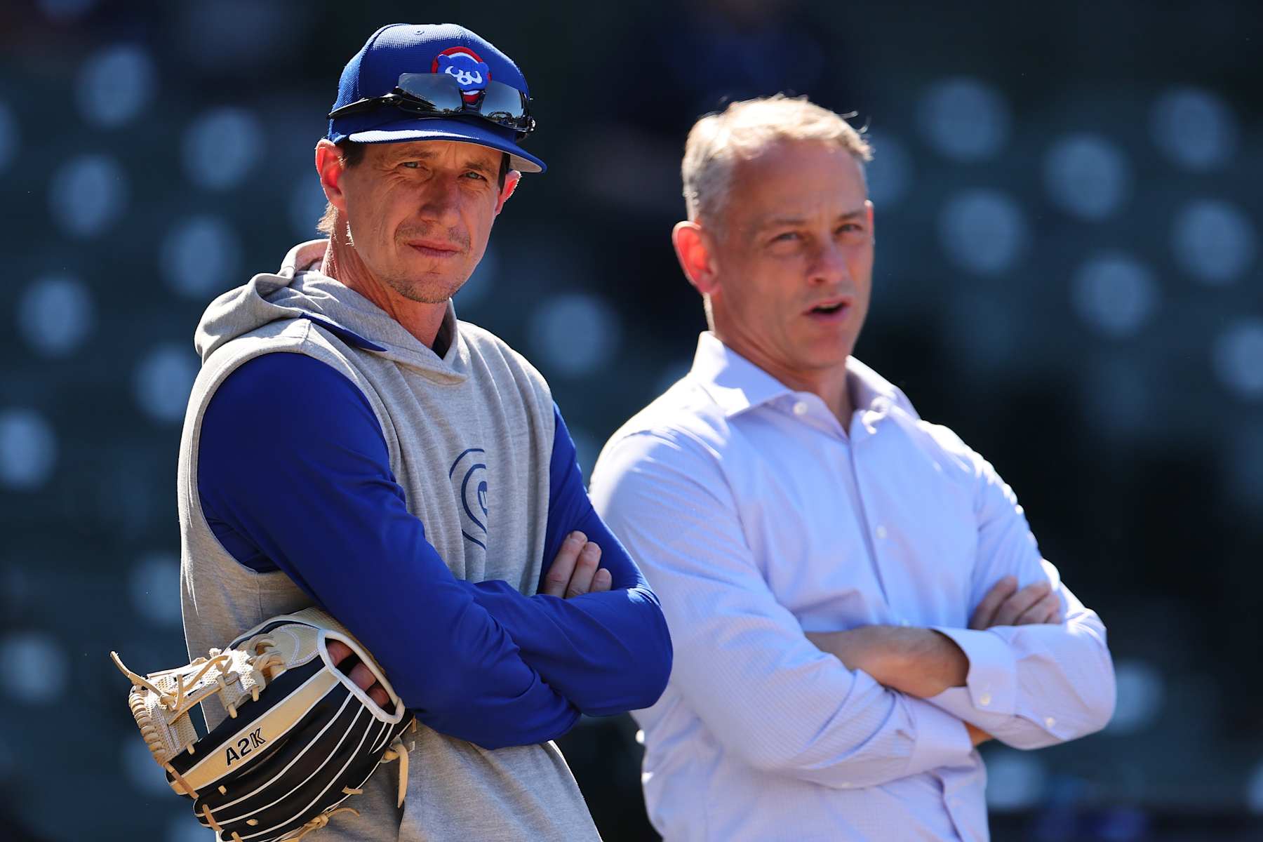 Craig Counsell (L) and Jed Hoyer (R)