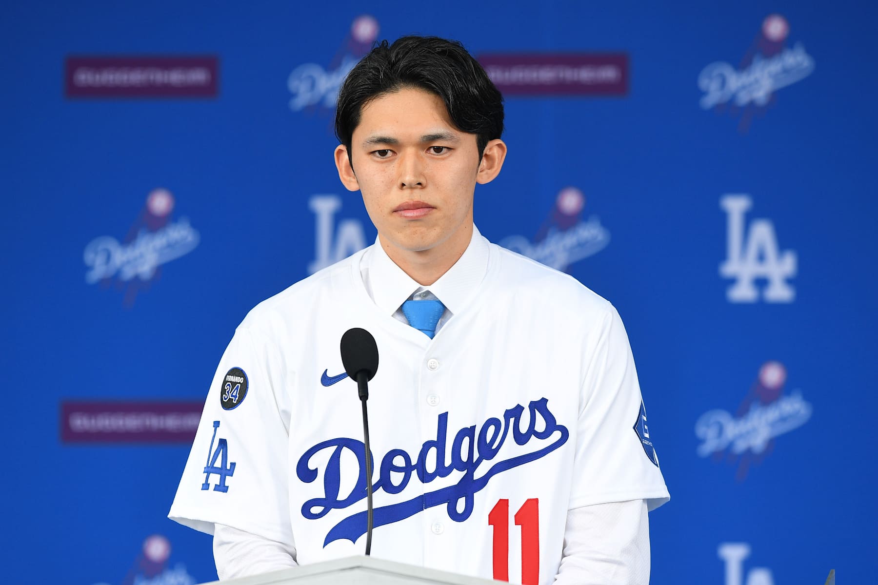 LOS ANGELES, CA - JANUARY 22: Newly acquired Los Angeles Dodgers pitcher Roki Sasaki takes questions at a press conference on January 22, 2025 at Dodger Stadium in Los Angeles, CA. (Photo by Brian Rothmuller/Icon Sportswire via Getty Images)